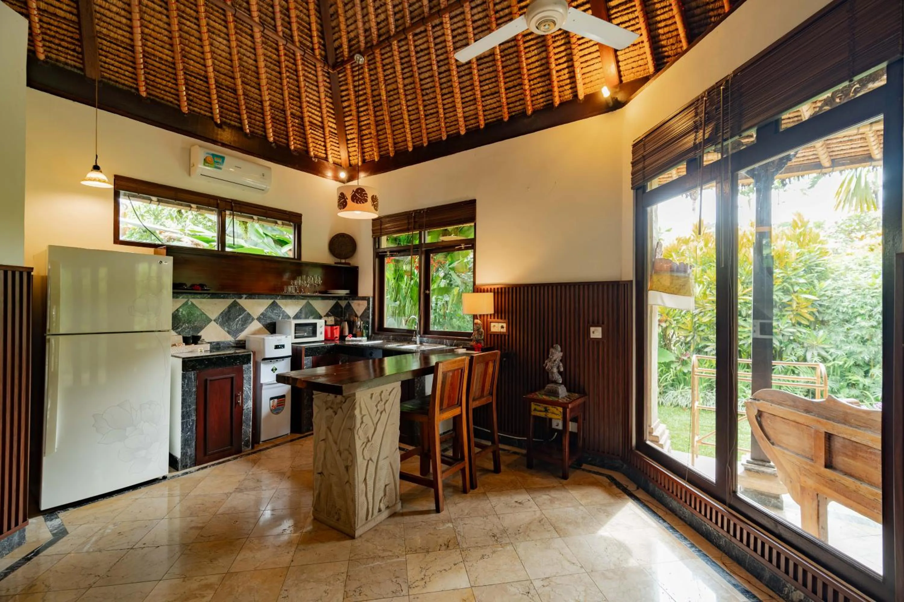 Kitchen or kitchenette in Sama's Cottages and Villas
