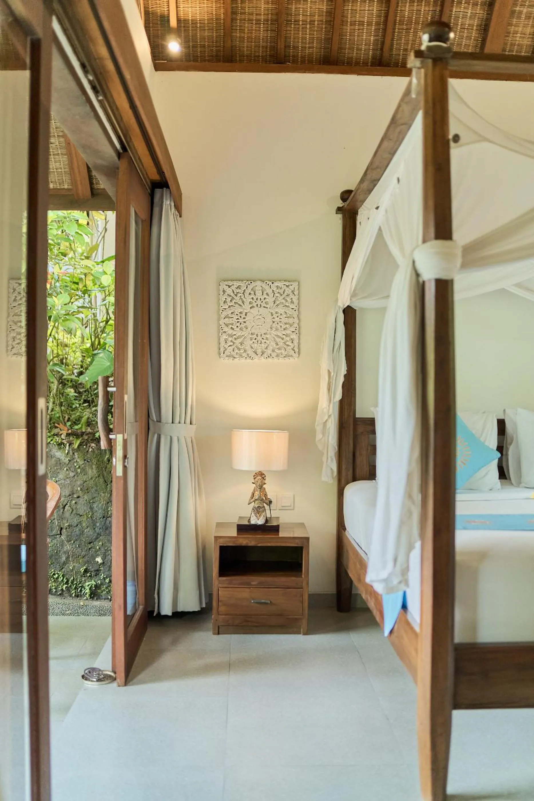 Bed in Sama's Cottages and Villas