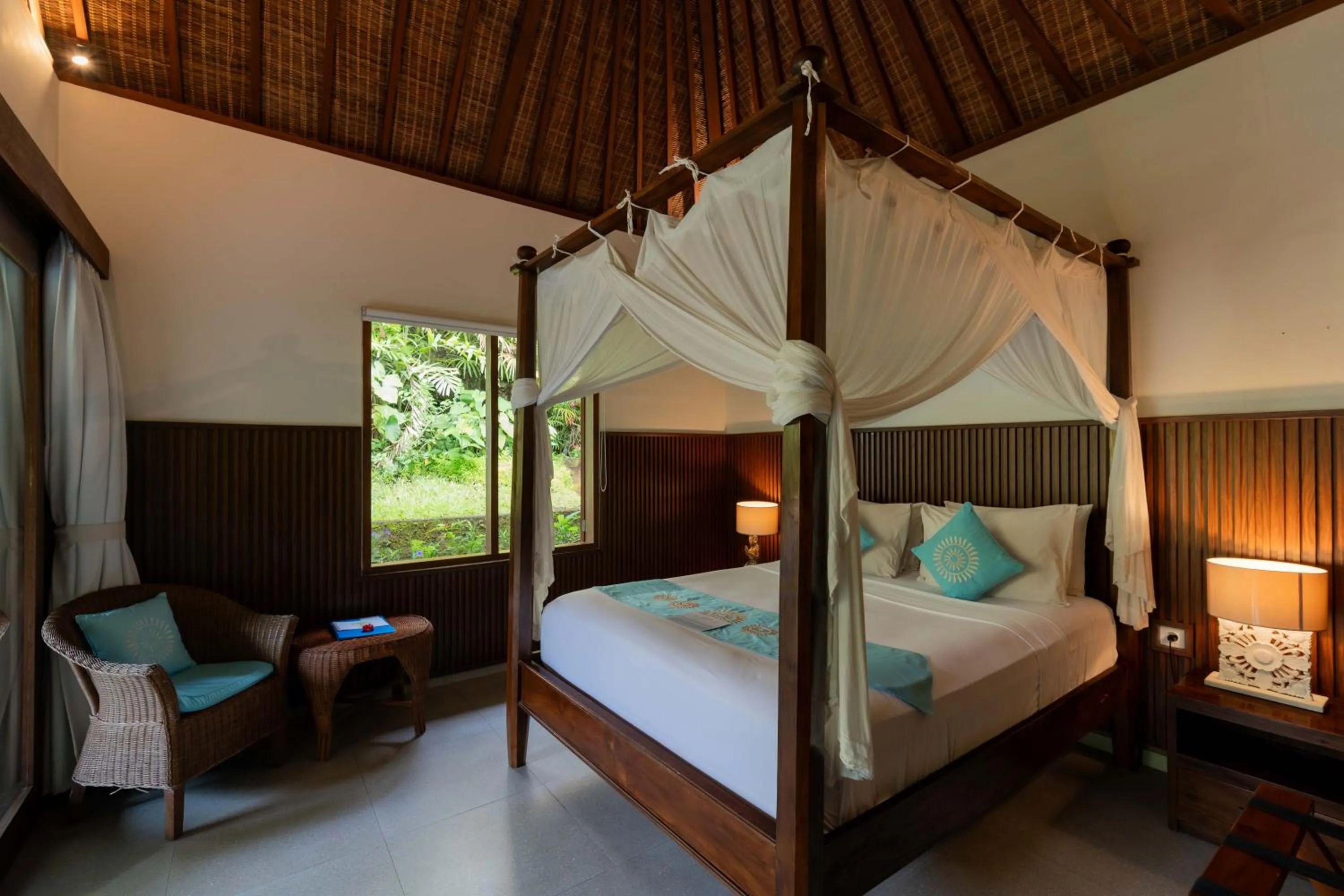 Bed in Sama's Cottages and Villas