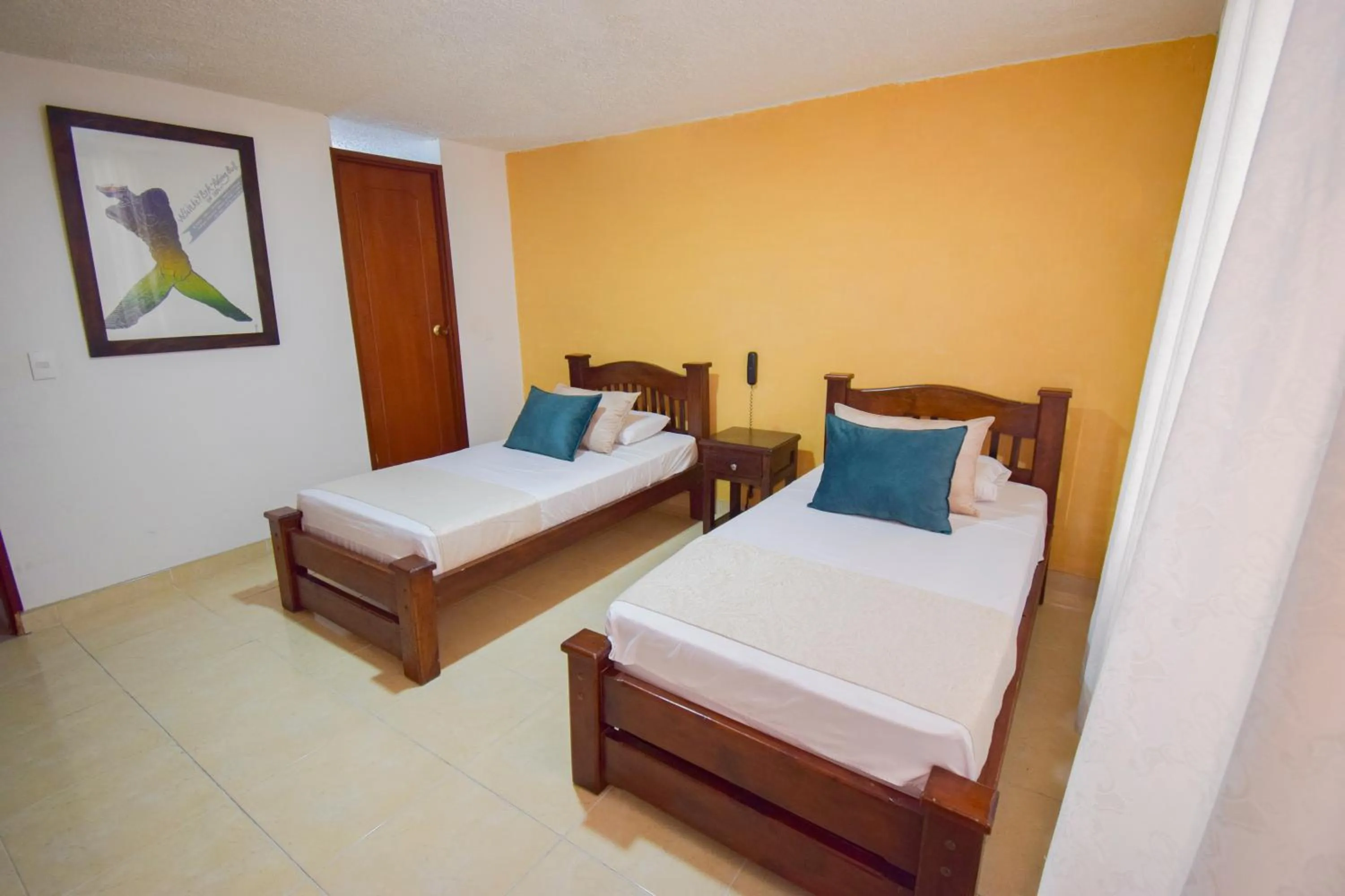 Bed in Hotel Toledo Plaza