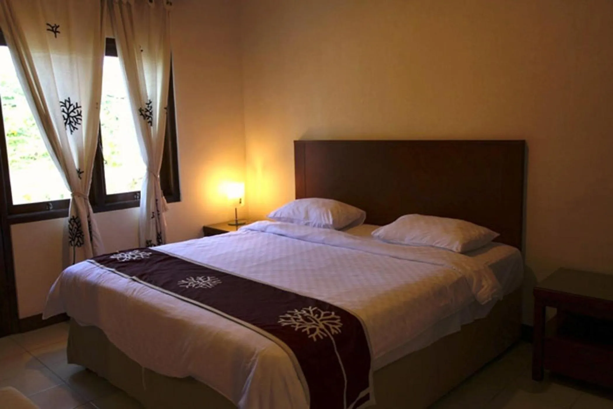 Bed in Niramaya Villa