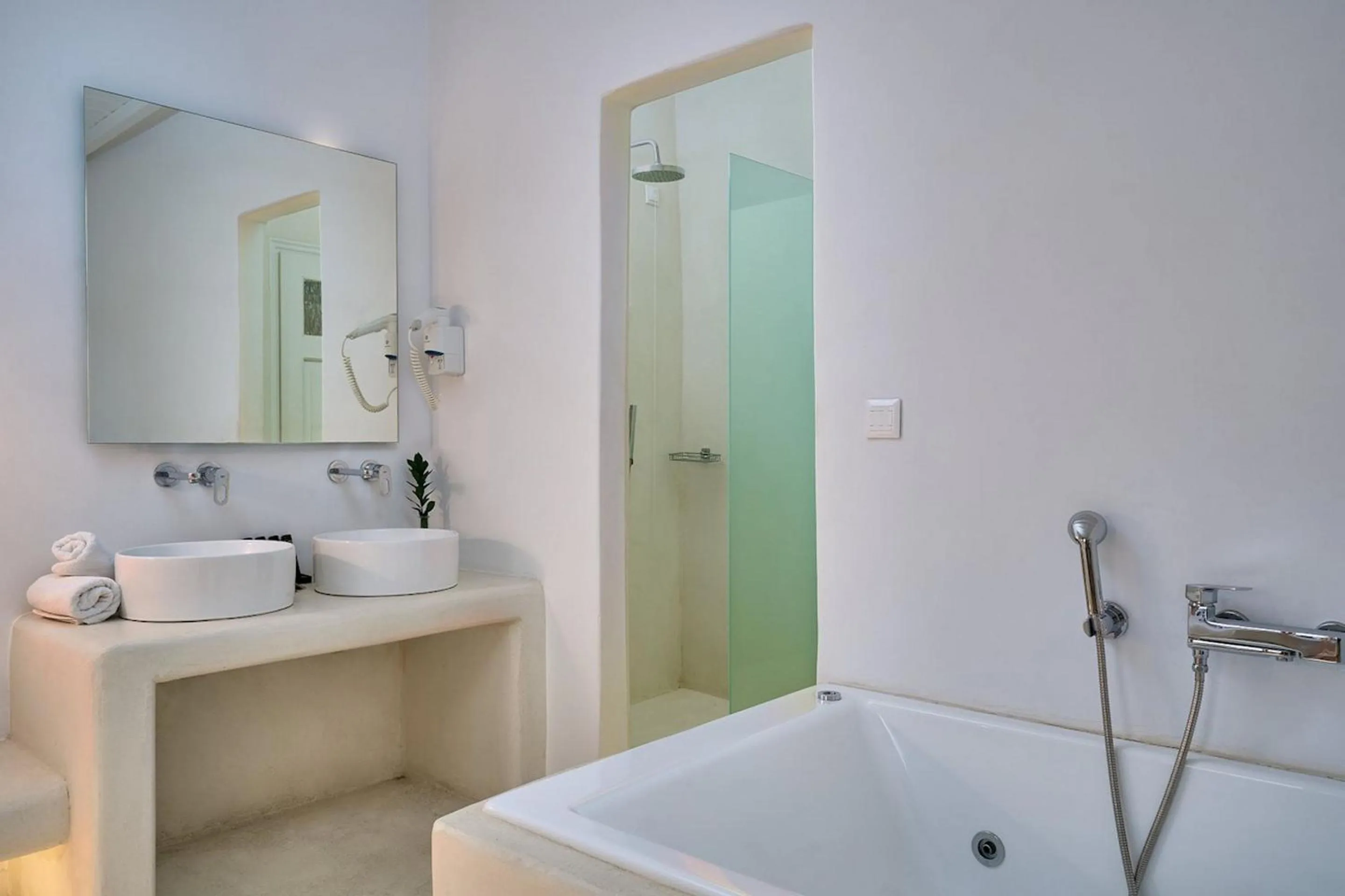 Shower in Paolas Τown Boutique Hotel