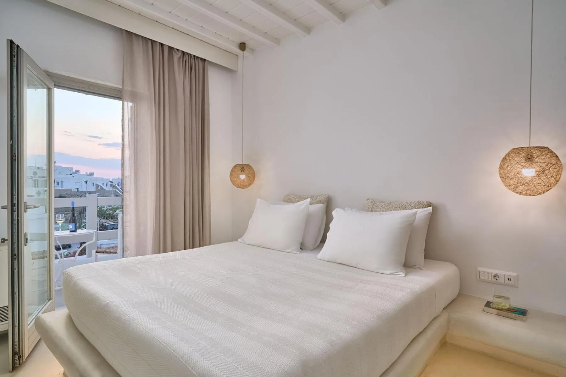 Bed in Paolas Τown Boutique Hotel