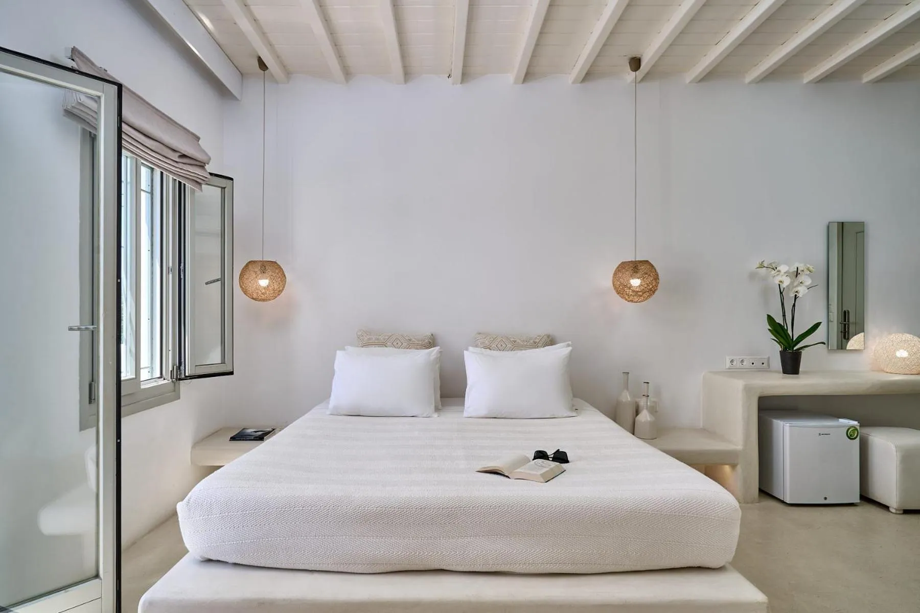 Bed in Paolas Τown Boutique Hotel