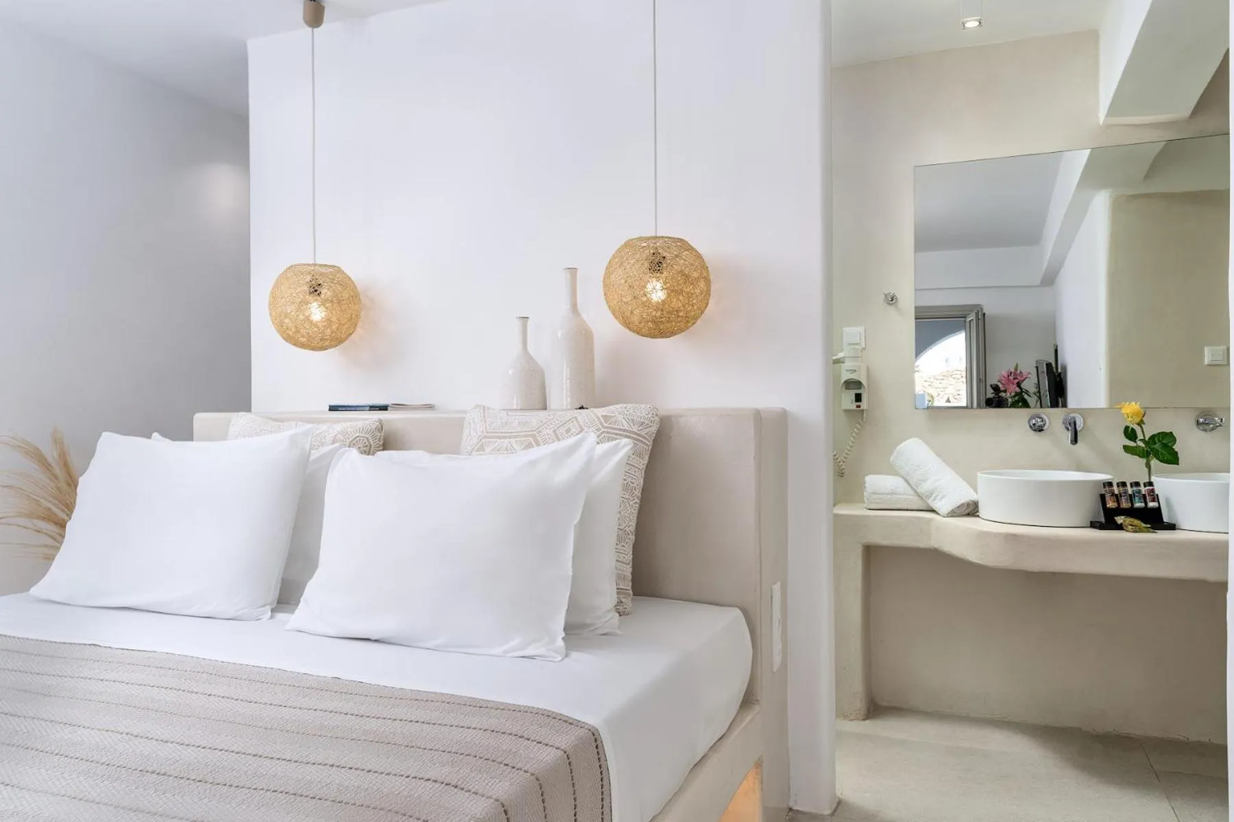 Bed in Paolas Τown Boutique Hotel