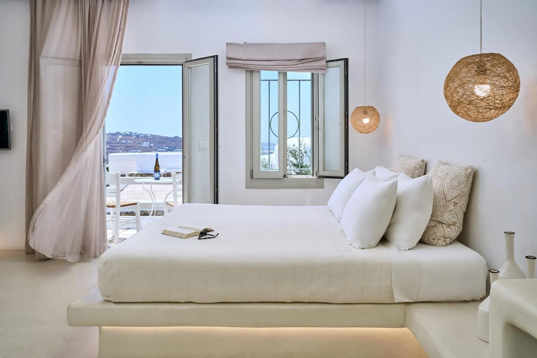 Bed in Paolas Τown Boutique Hotel