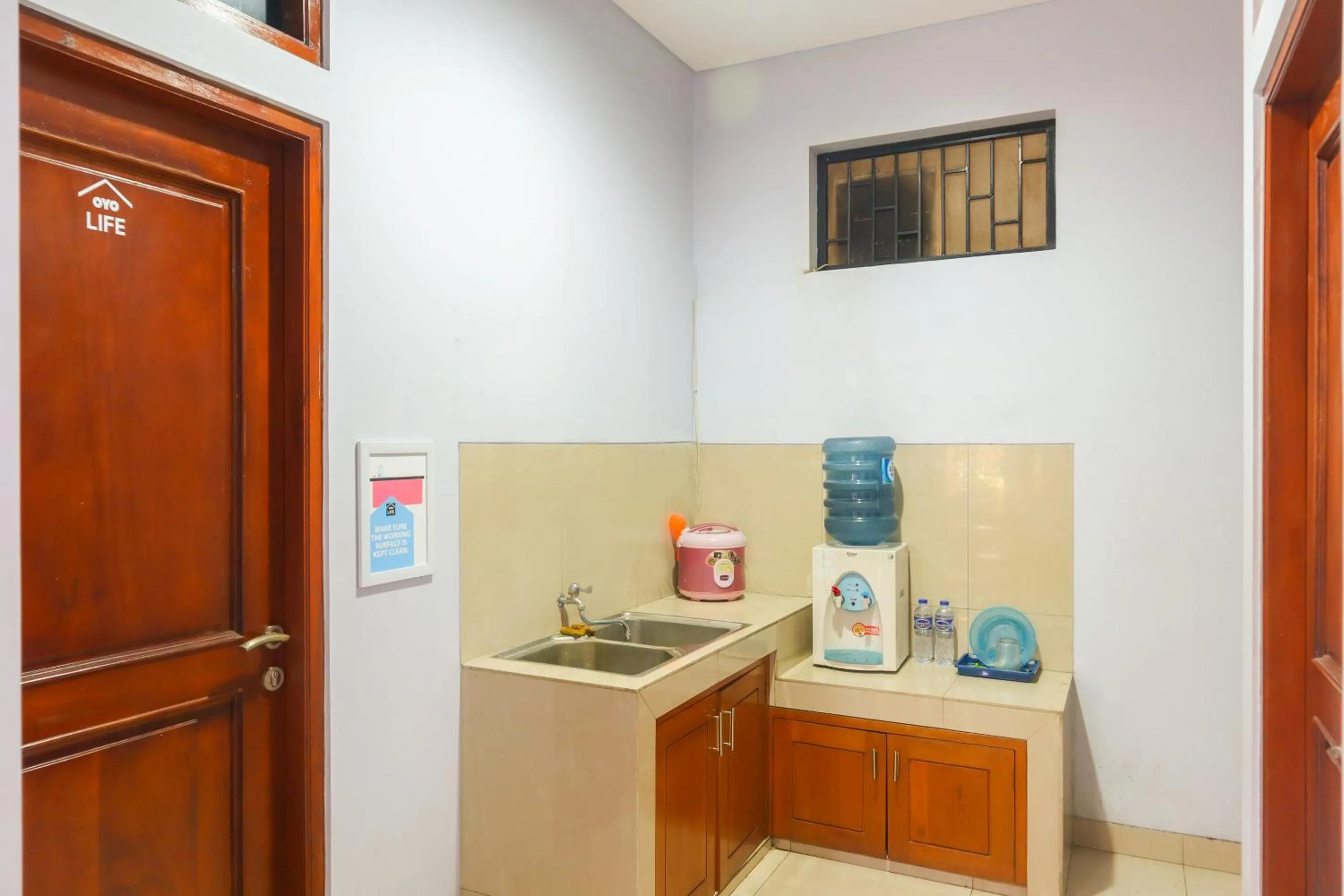 Kitchen or kitchenette in KoolKost Syariah @ Duri Kosambi