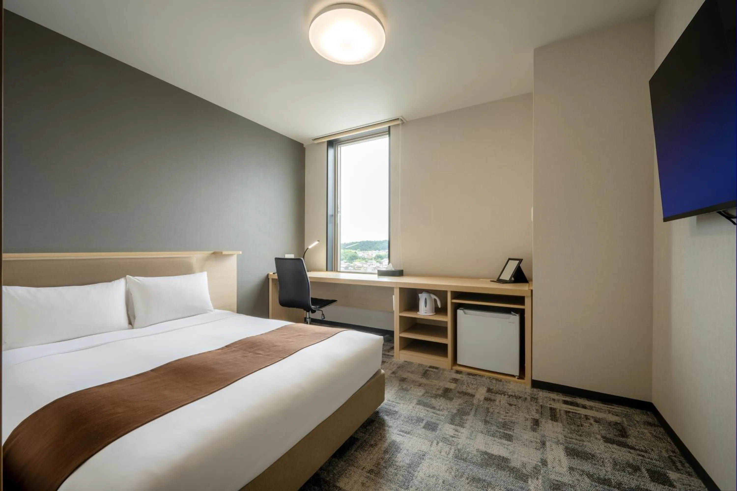 Photo of the whole room, Bed in Hotel Maruya Grande