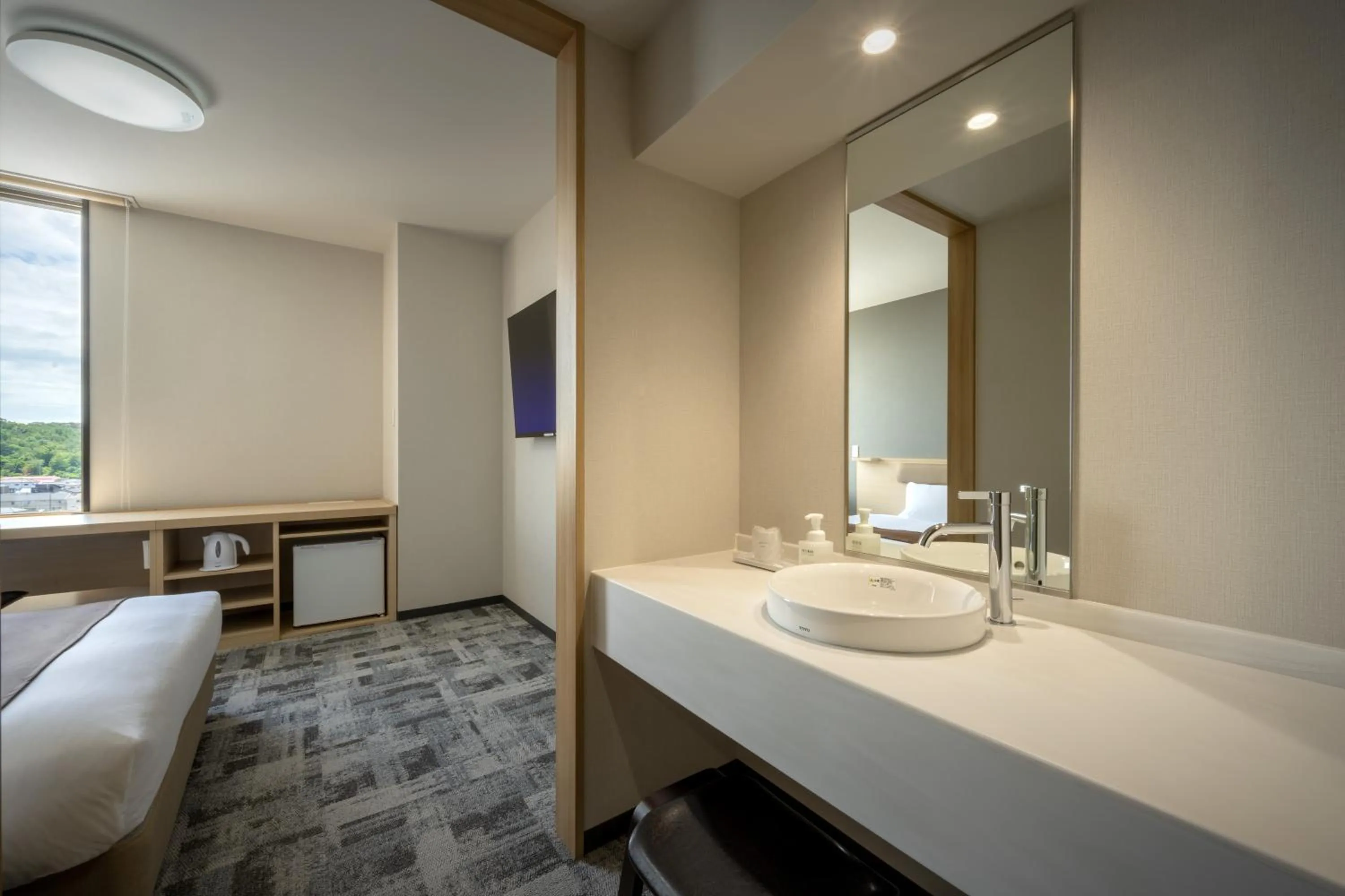 Photo of the whole room, Bed in Hotel Maruya Grande