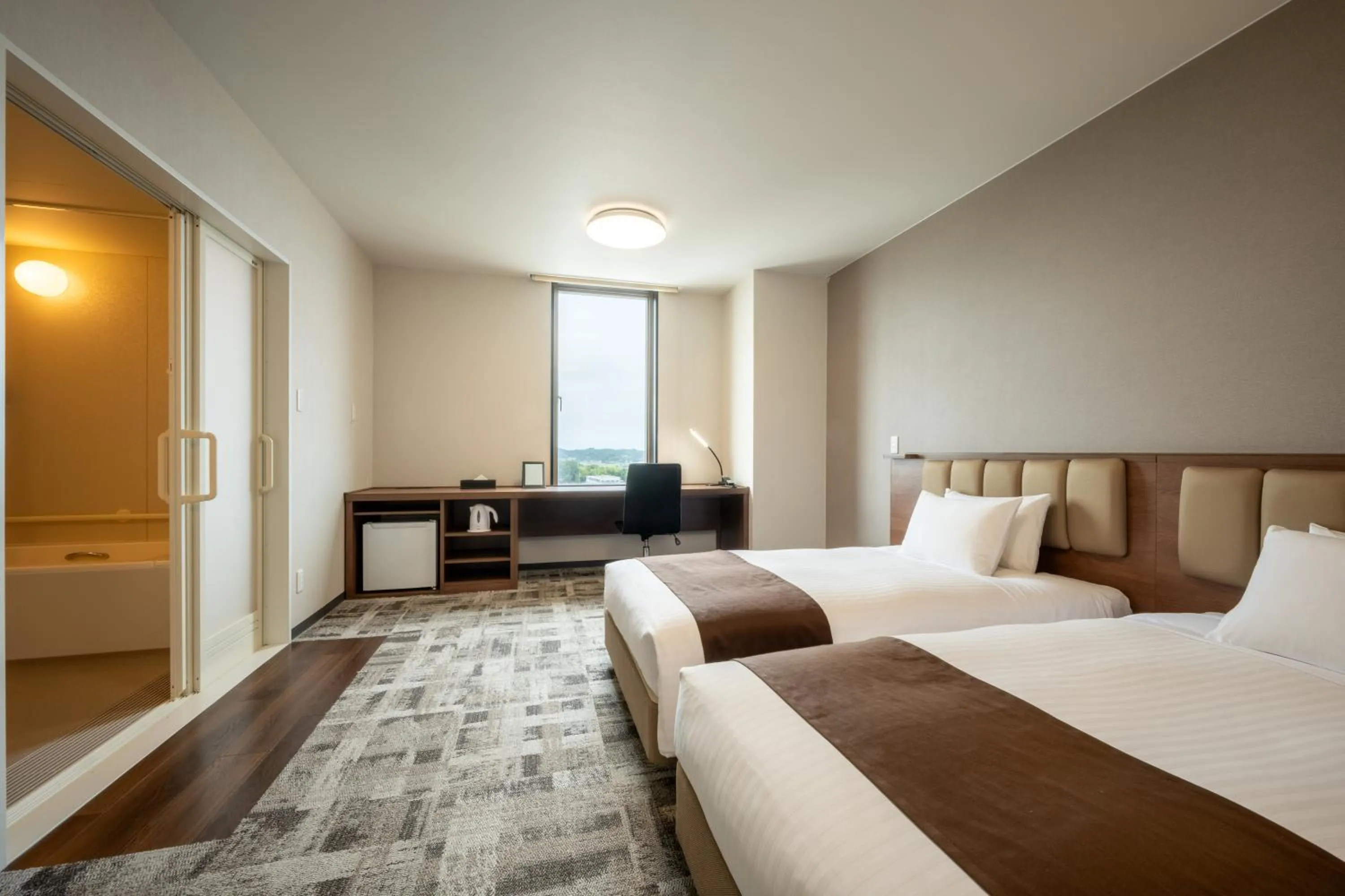 Photo of the whole room, Bed in Hotel Maruya Grande