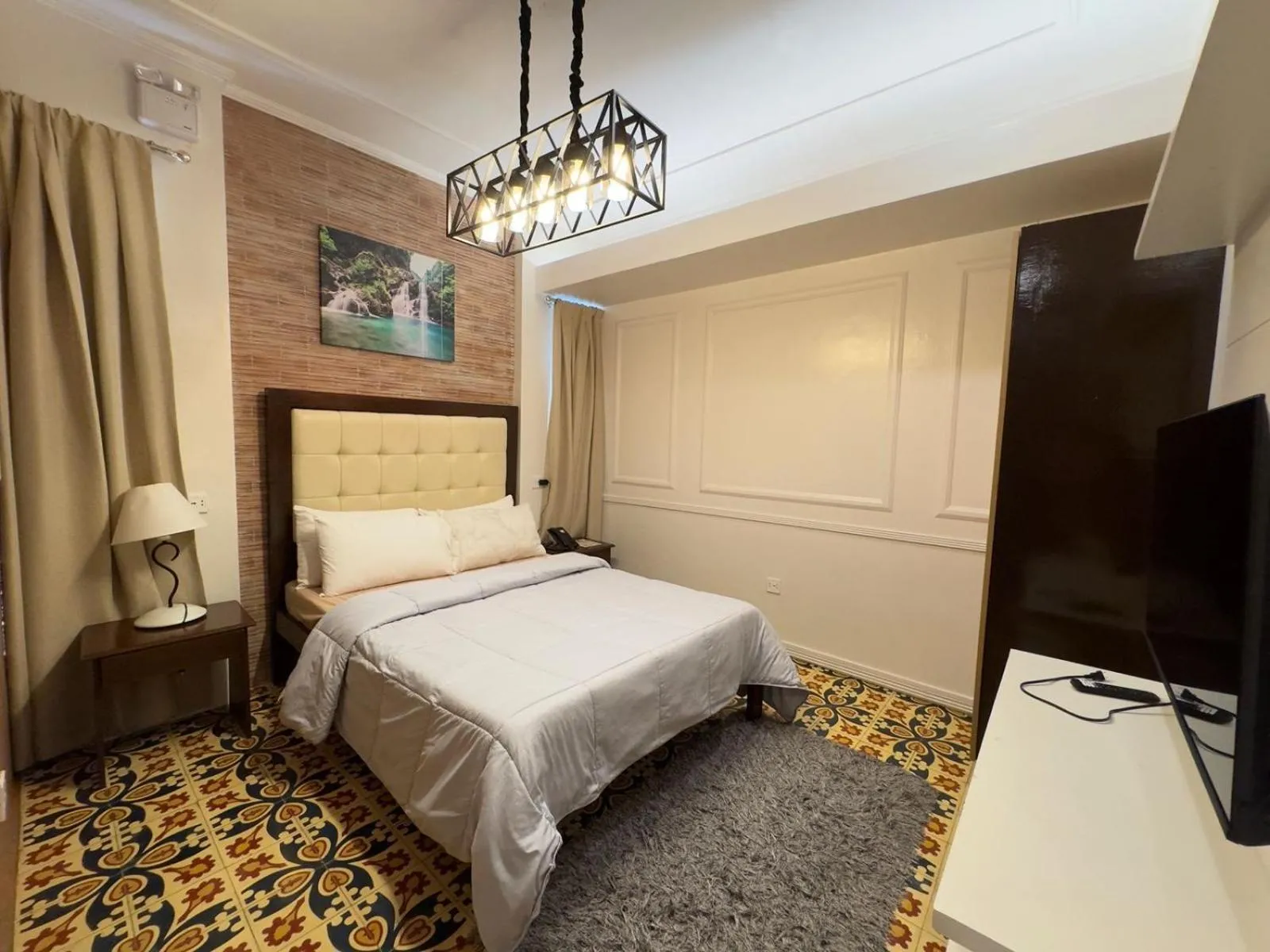 TV and multimedia, Bed in Armando's Garden Resort and Restaurant