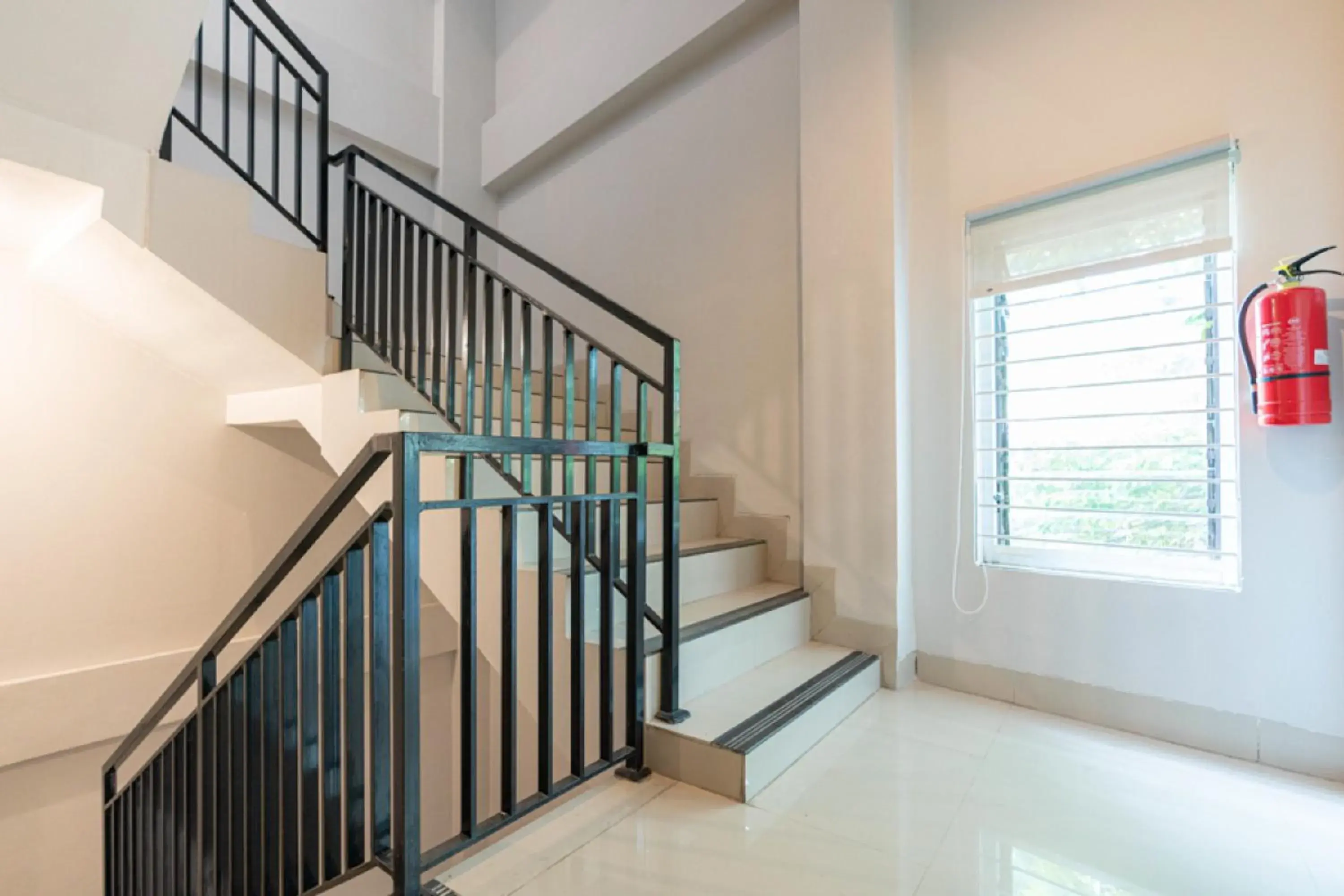 Property building in RedDoorz Plus At Harvest Inn Panakkukang Property building in RedDoorz Plus At Harvest Inn Panakkukang