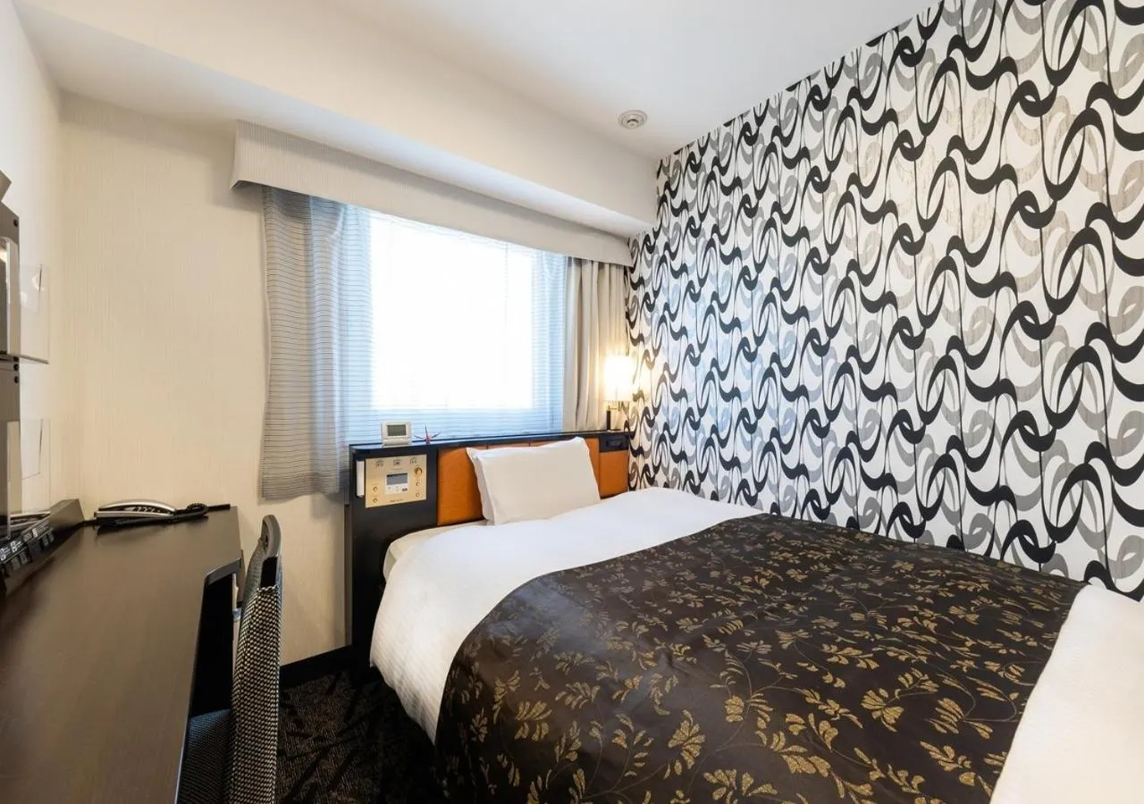 Bed in APA Hotel Chiba Ekimae