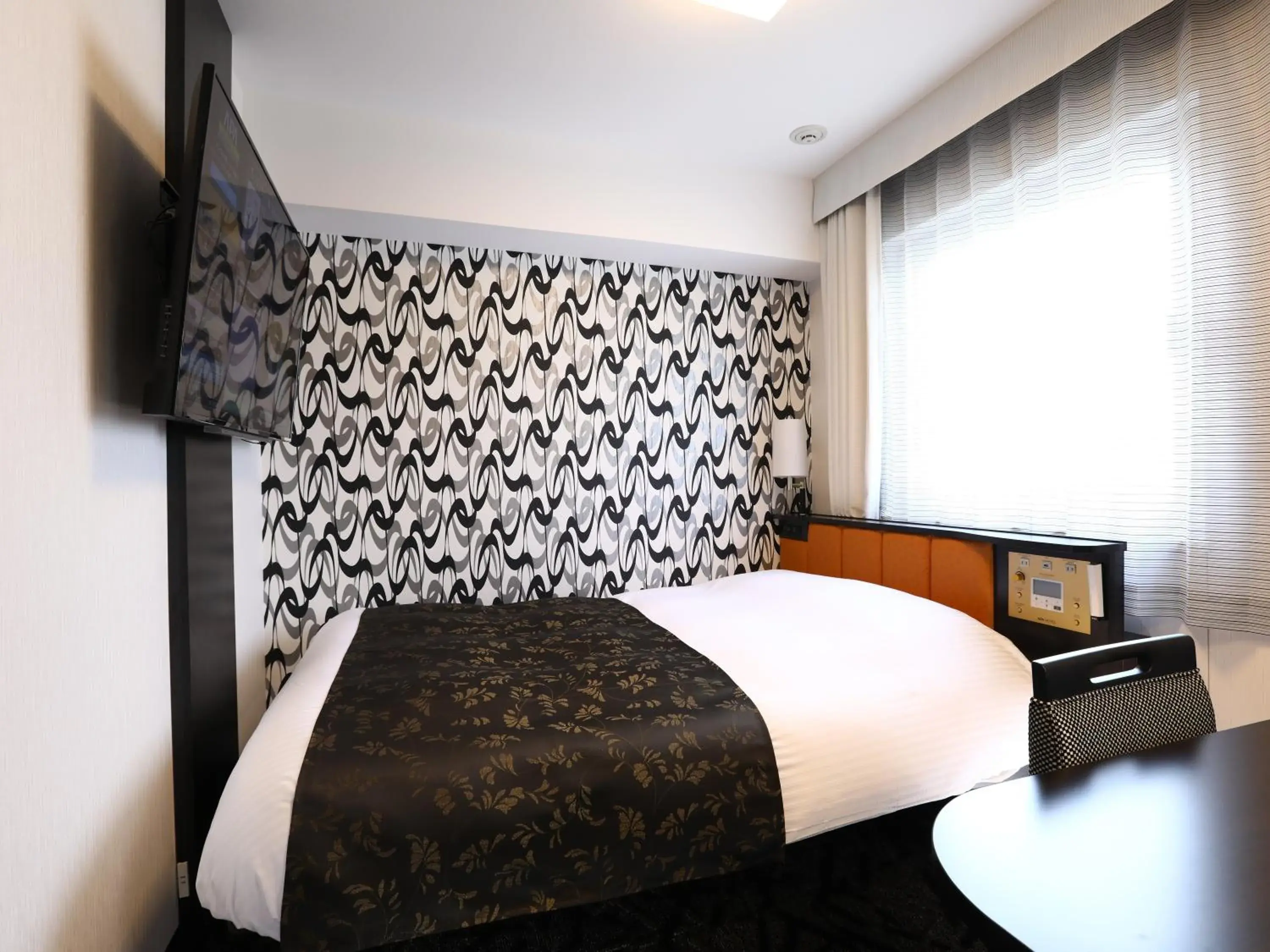 Bed in APA Hotel Chiba Ekimae Bed in APA Hotel Chiba Ekimae