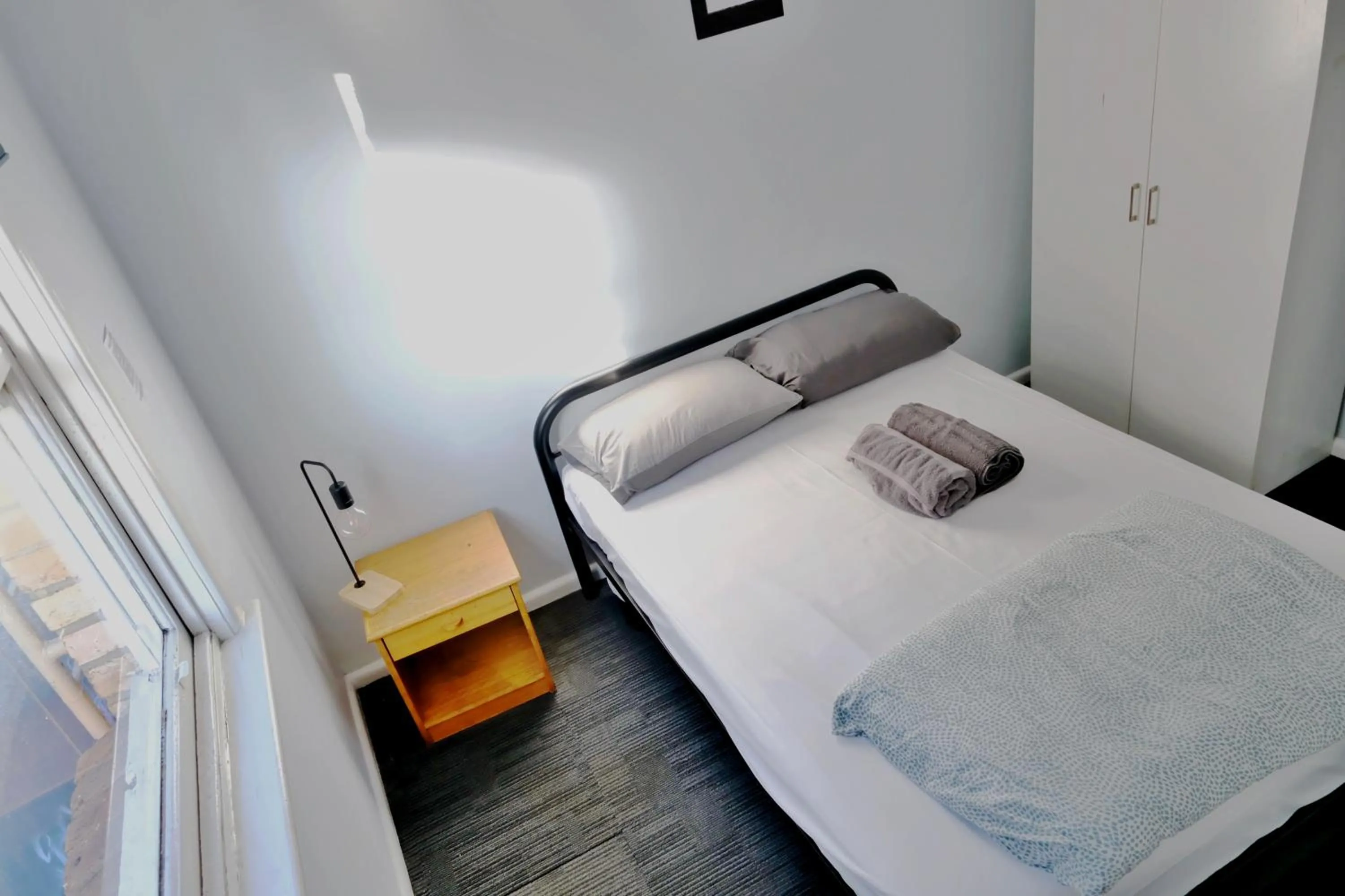 Bed in Pint On Punt Backpackers