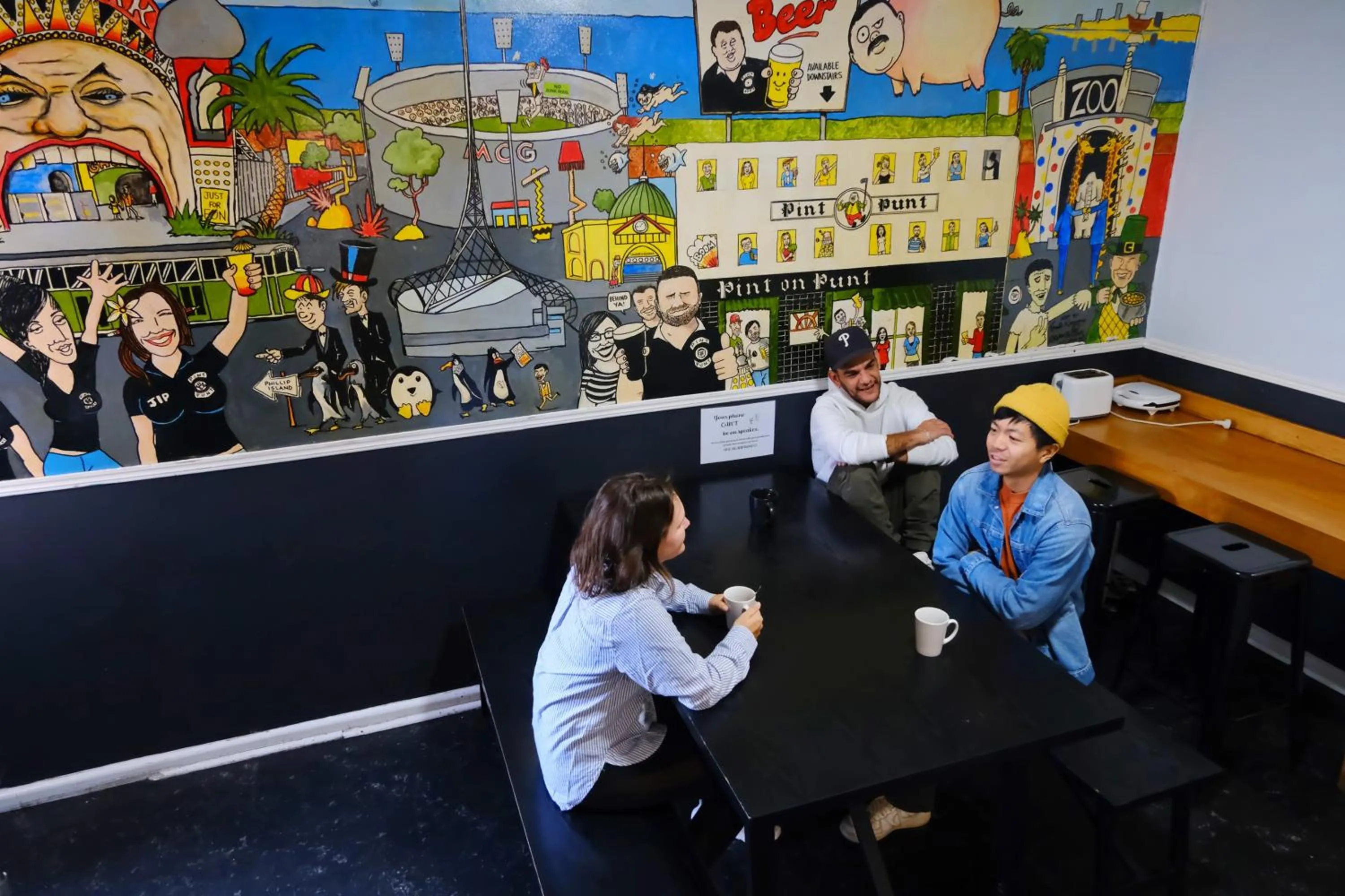 People in Pint On Punt Backpackers