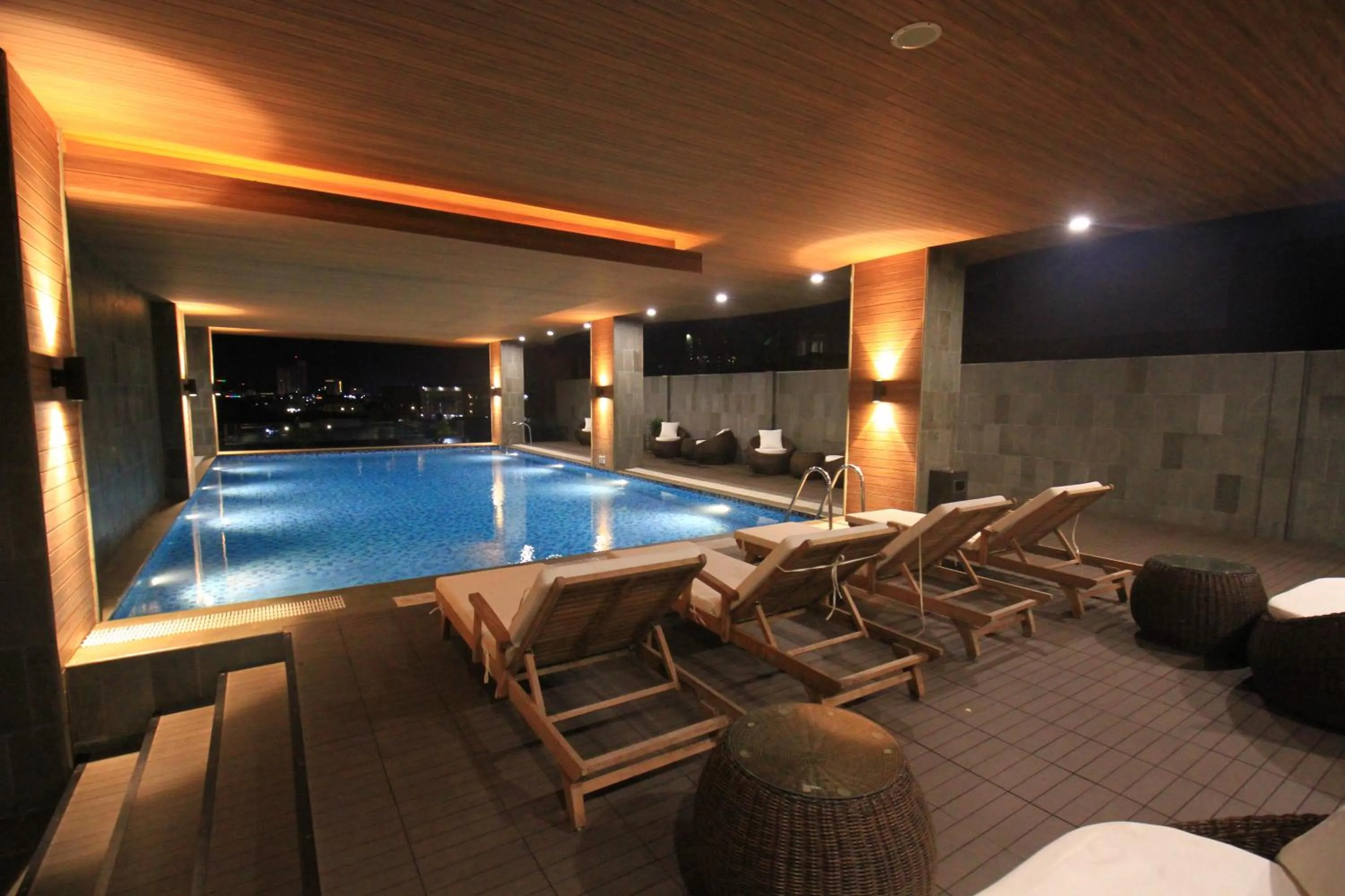 Swimming pool in Asialink Hotel Batam by Prasanthi