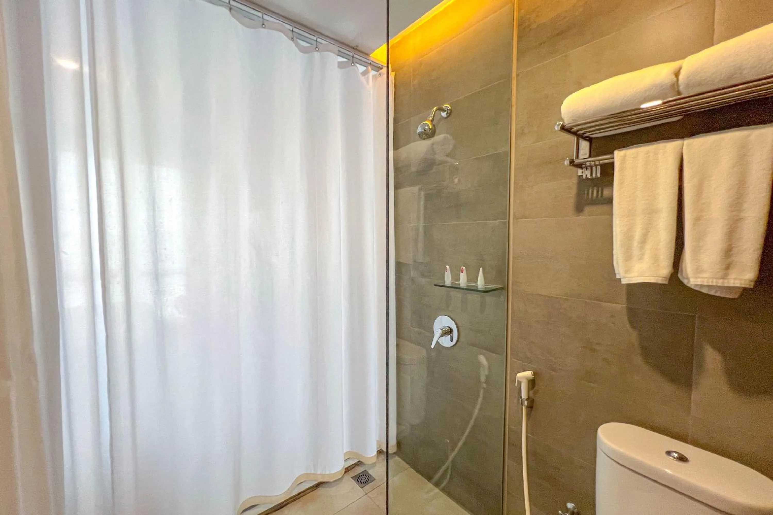 Bathroom in Asialink Hotel Batam by Prasanthi