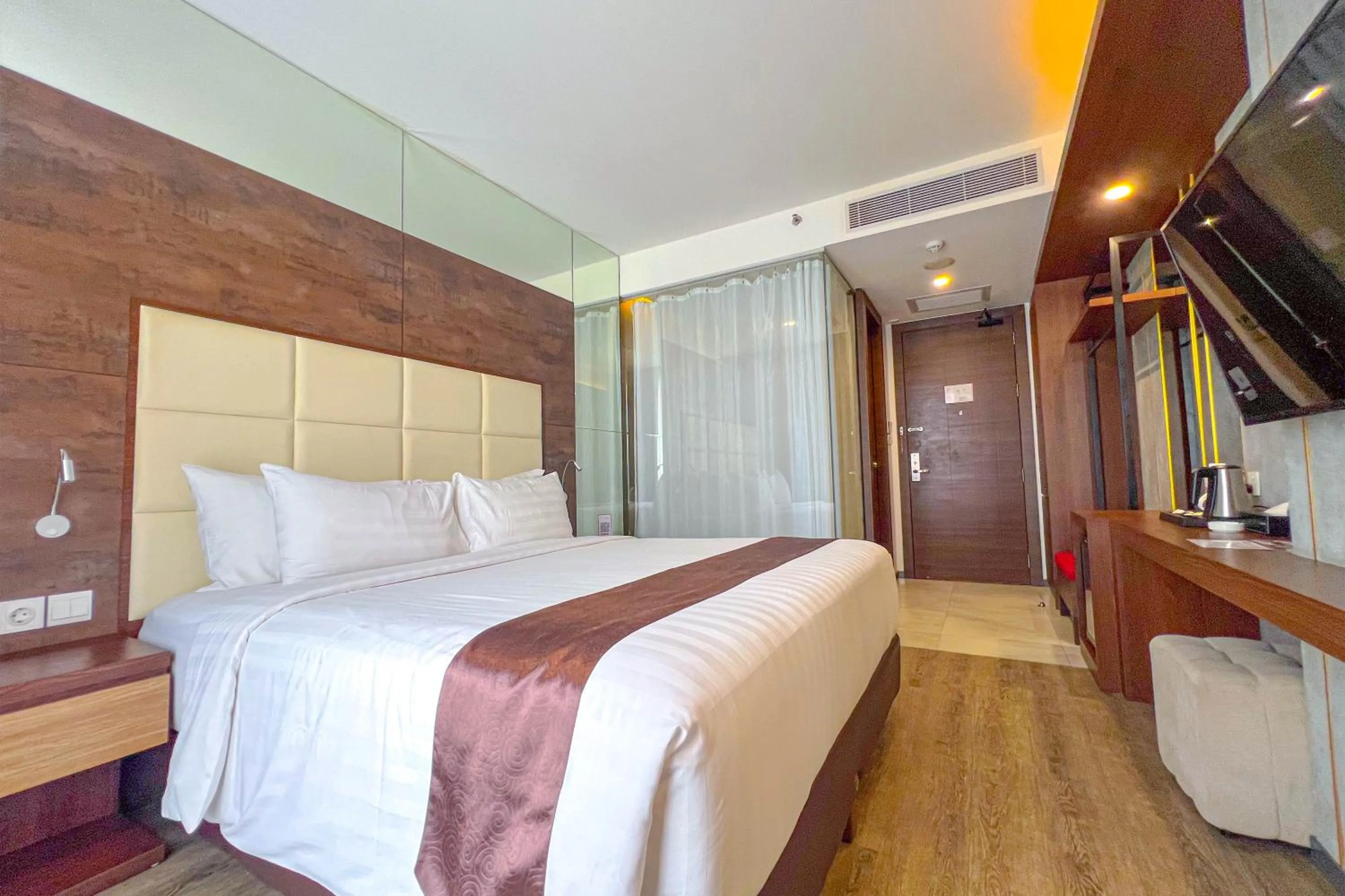 Bed in Asialink Hotel Batam by Prasanthi