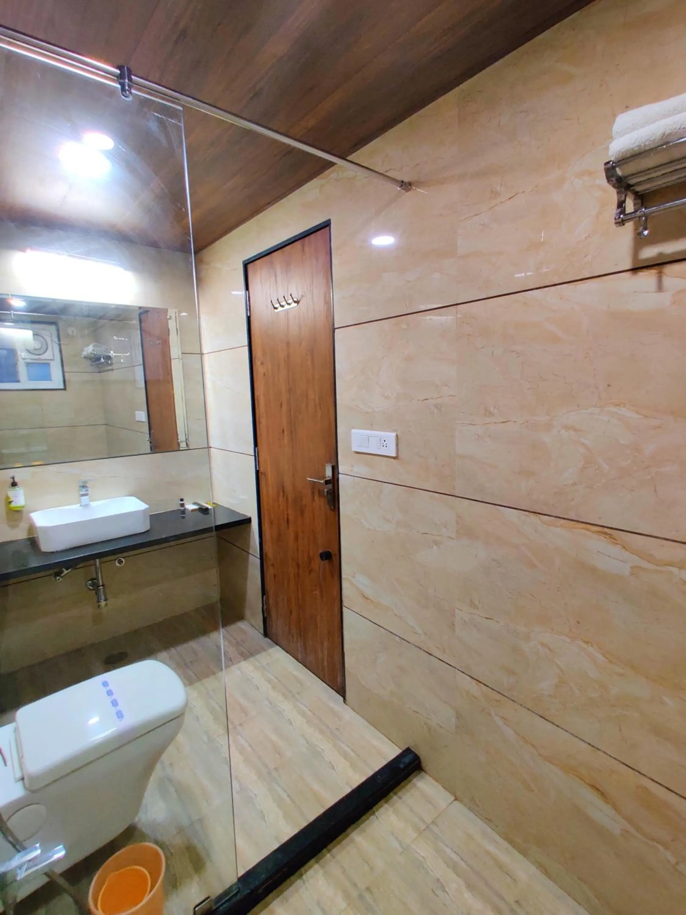 Bathroom in Opulence Inn - 500 Meters From Railway Station