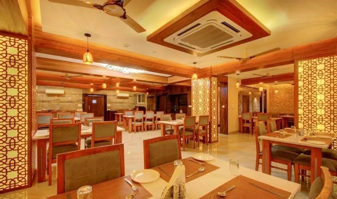 Restaurant/places to eat in Opulence Inn - 500 Meters From Railway Station