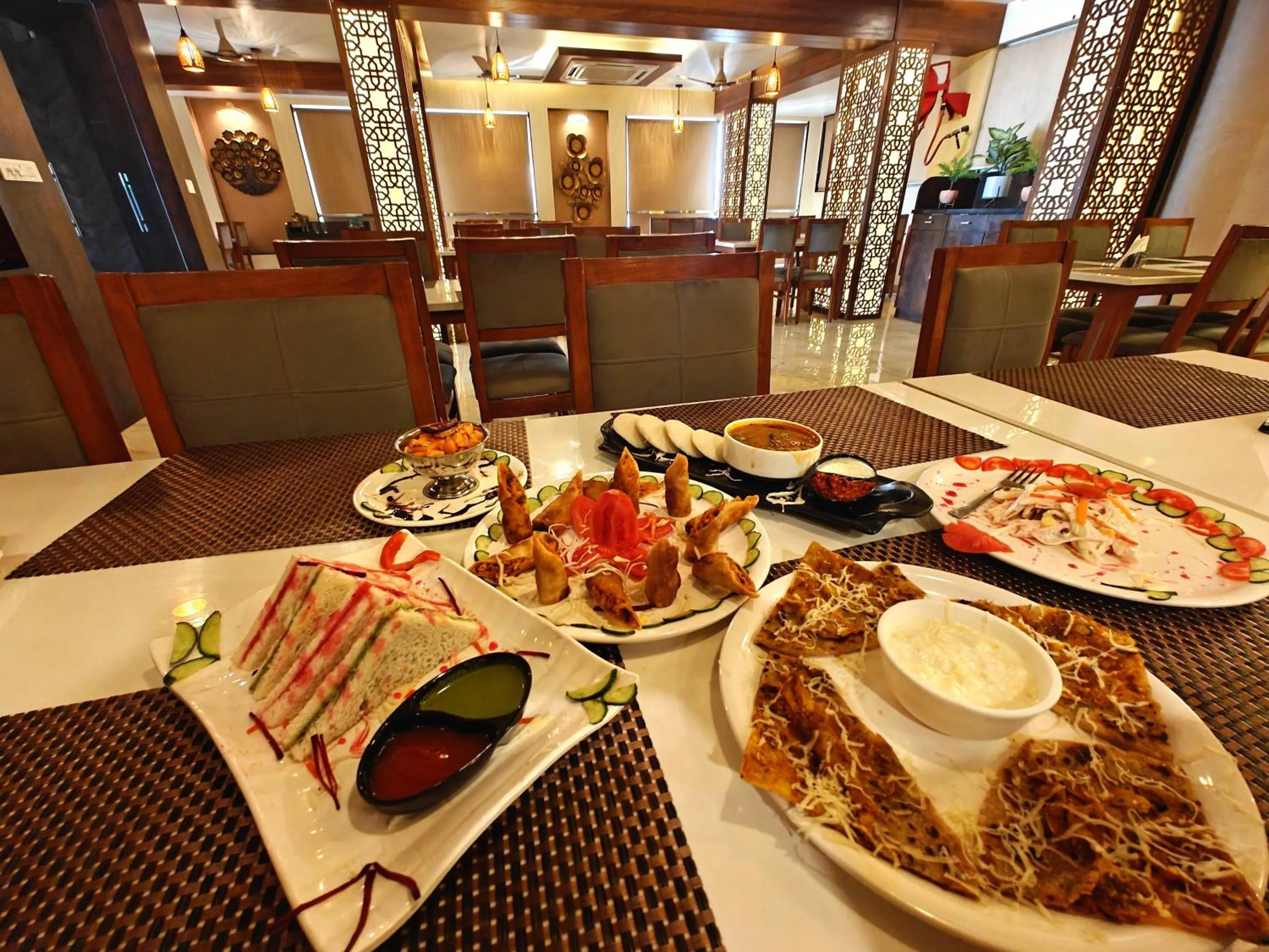 Restaurant/places to eat in Opulence Inn - 500 Meters From Railway Station