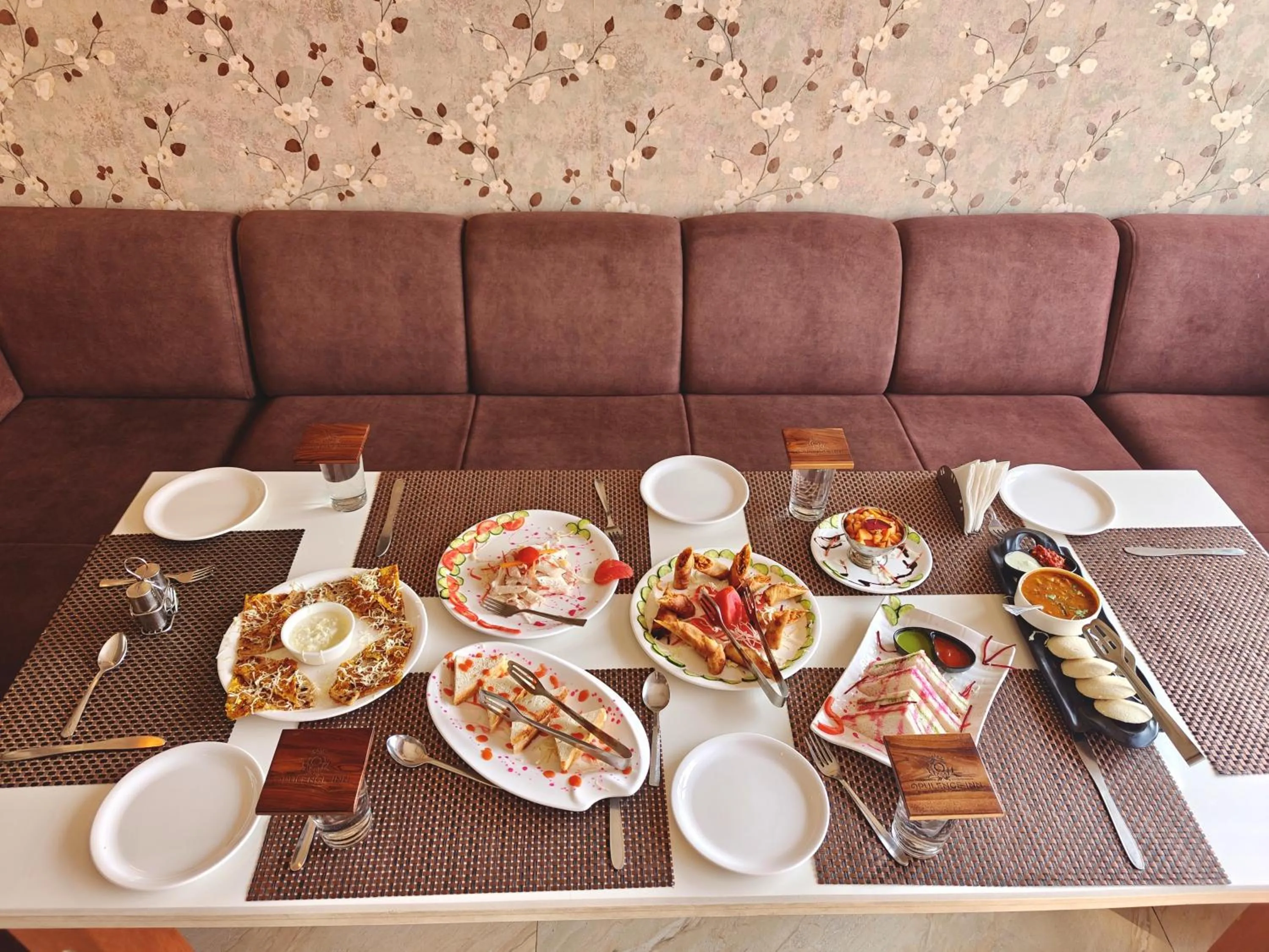 Restaurant/places to eat in Opulence Inn - 500 Meters From Railway Station