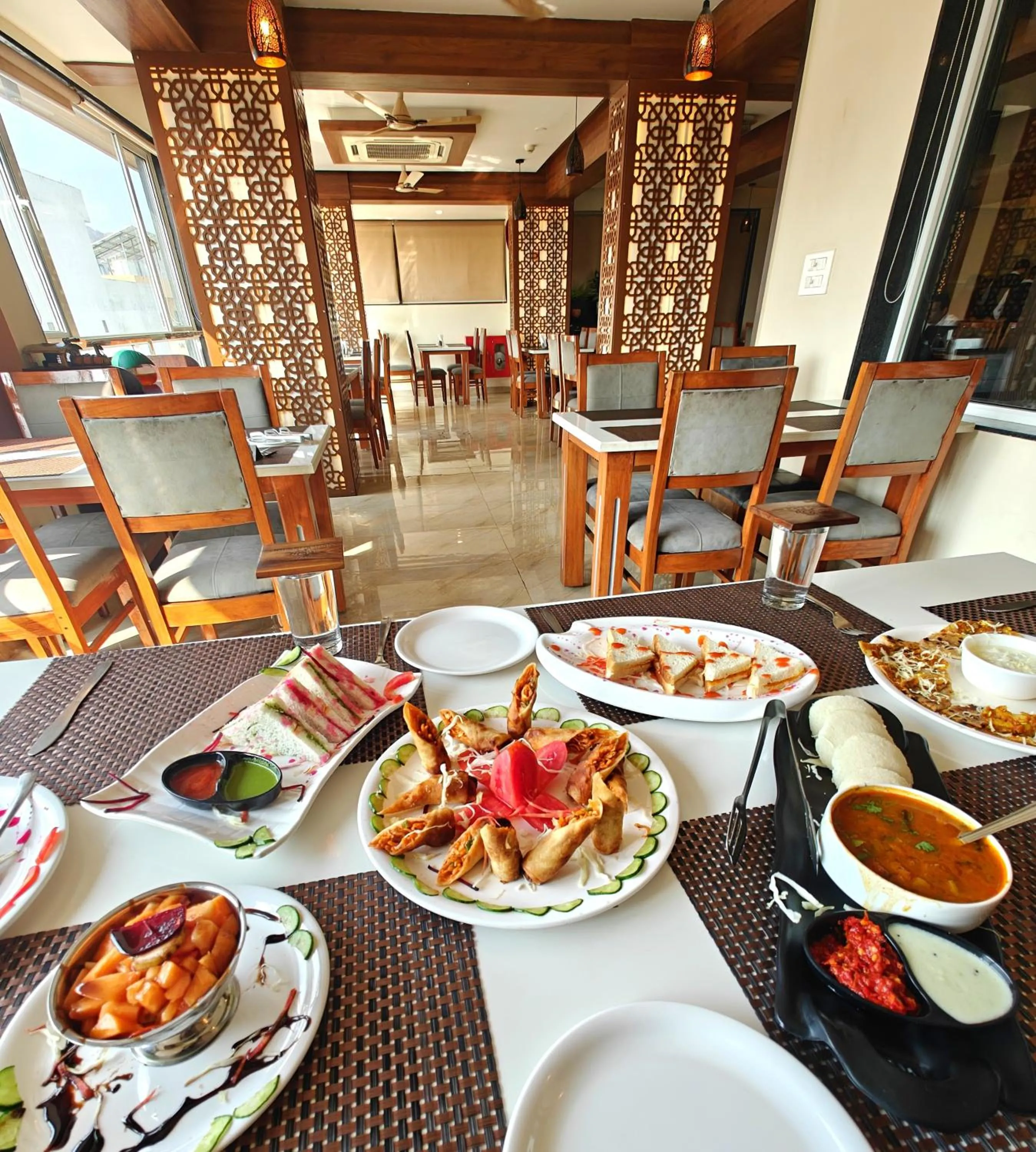 Restaurant/places to eat in Opulence Inn - 500 Meters From Railway Station
