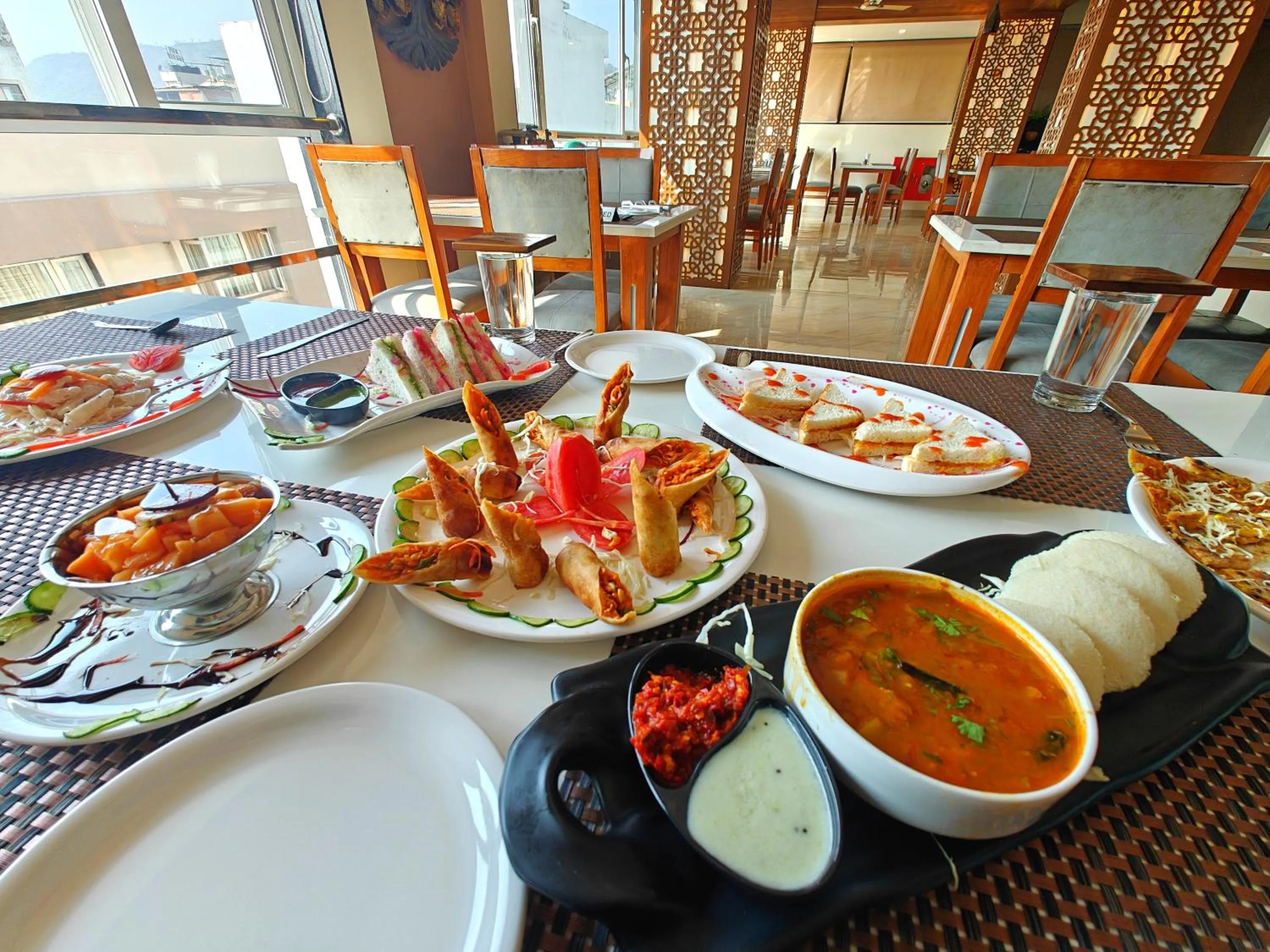 Restaurant/places to eat in Opulence Inn - 500 Meters From Railway Station