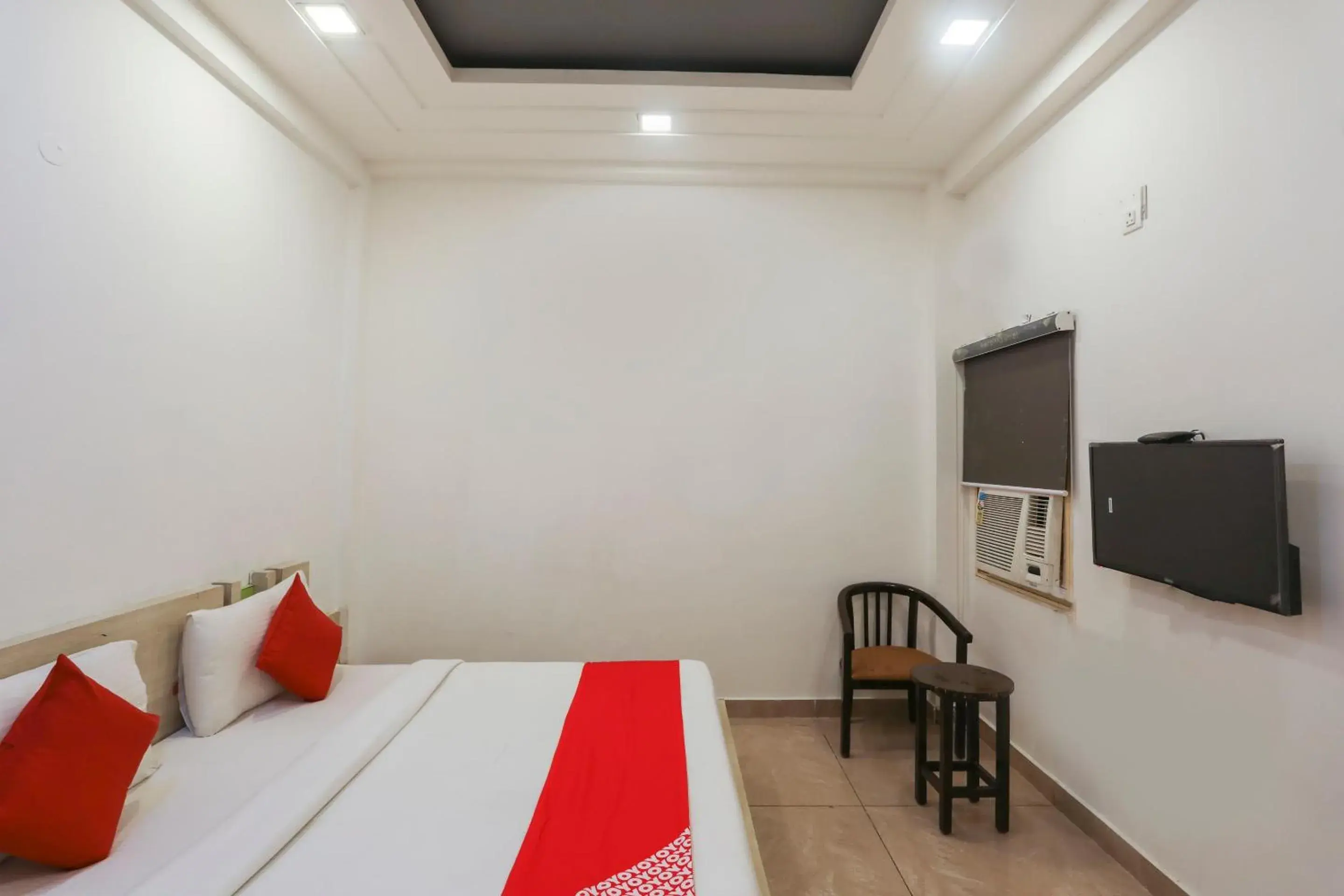 Bedroom, Bed in OYO Cladis Near Mall Of India