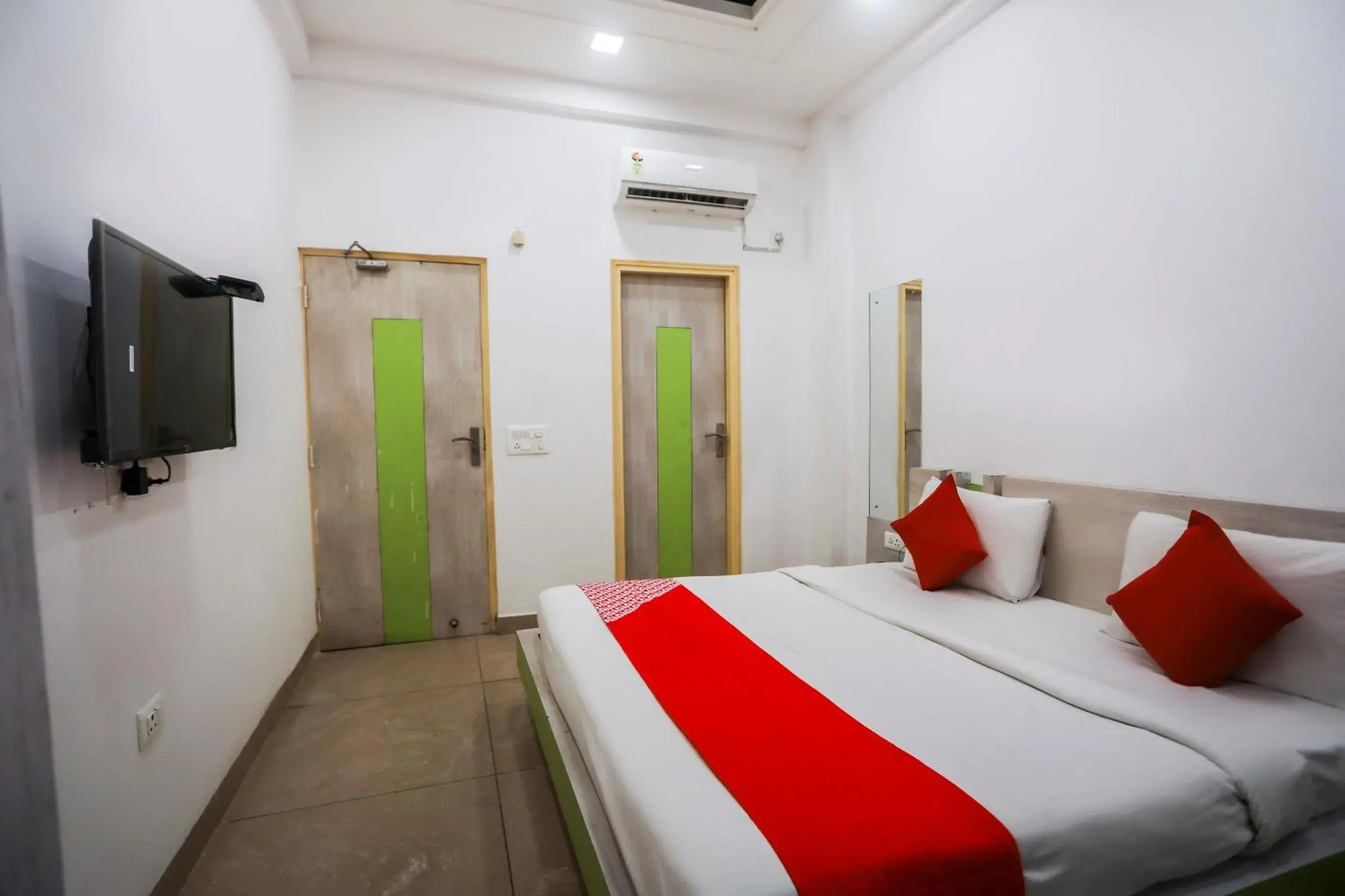 Bedroom, Bed in OYO Cladis Near Mall Of India