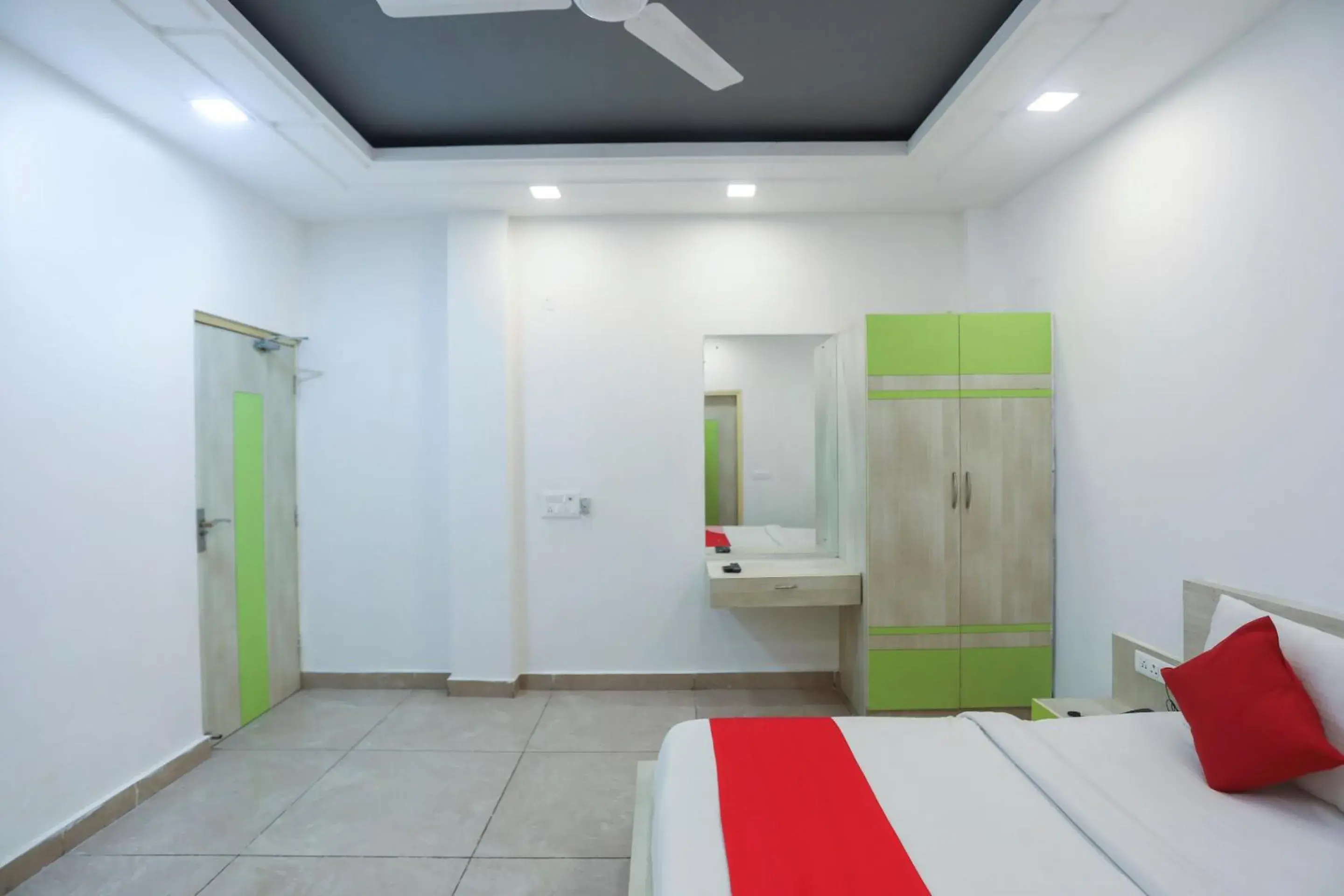 Bedroom in OYO Cladis Near Mall Of India