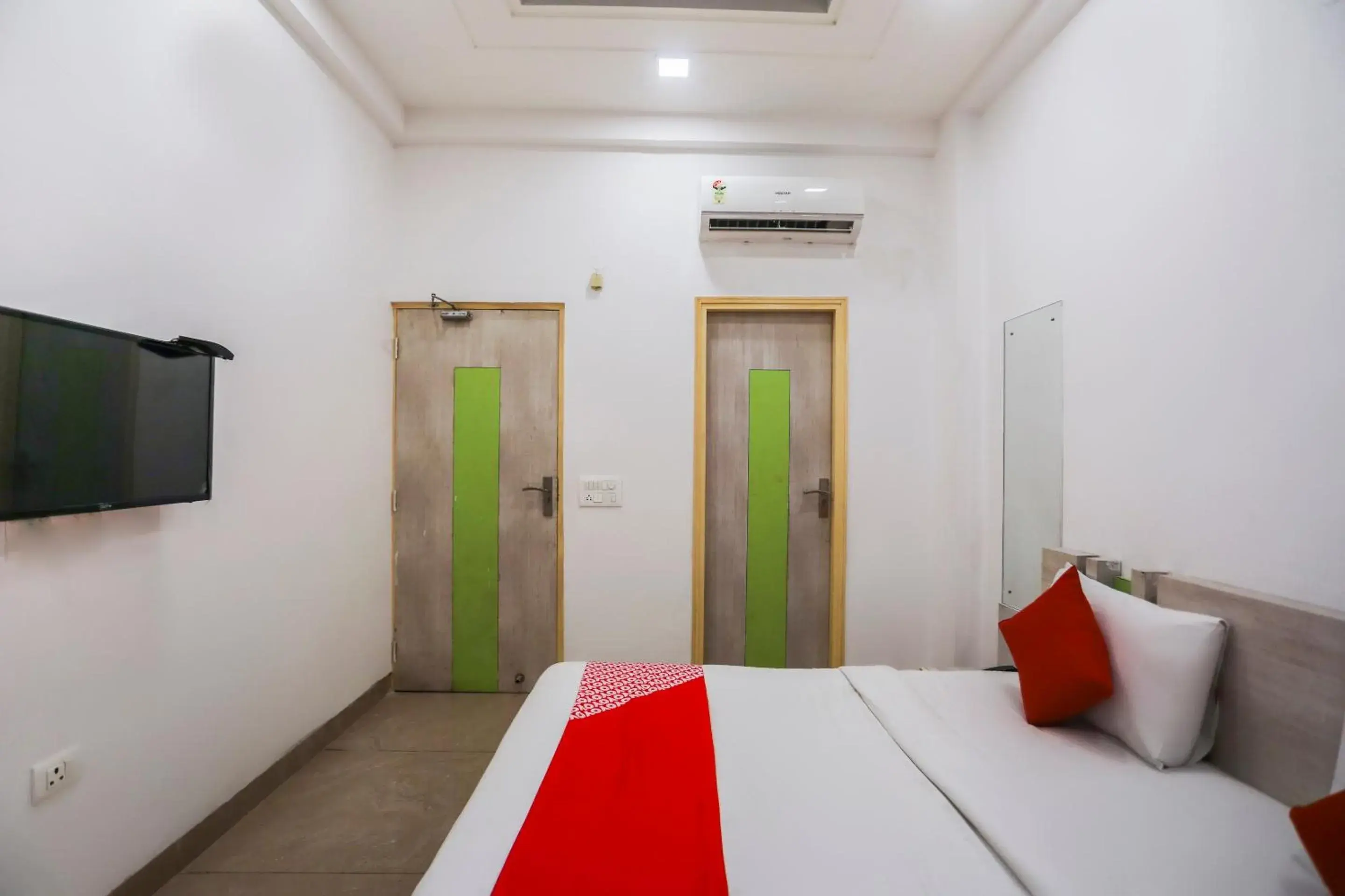 Bedroom, Bed in OYO Cladis Near Mall Of India