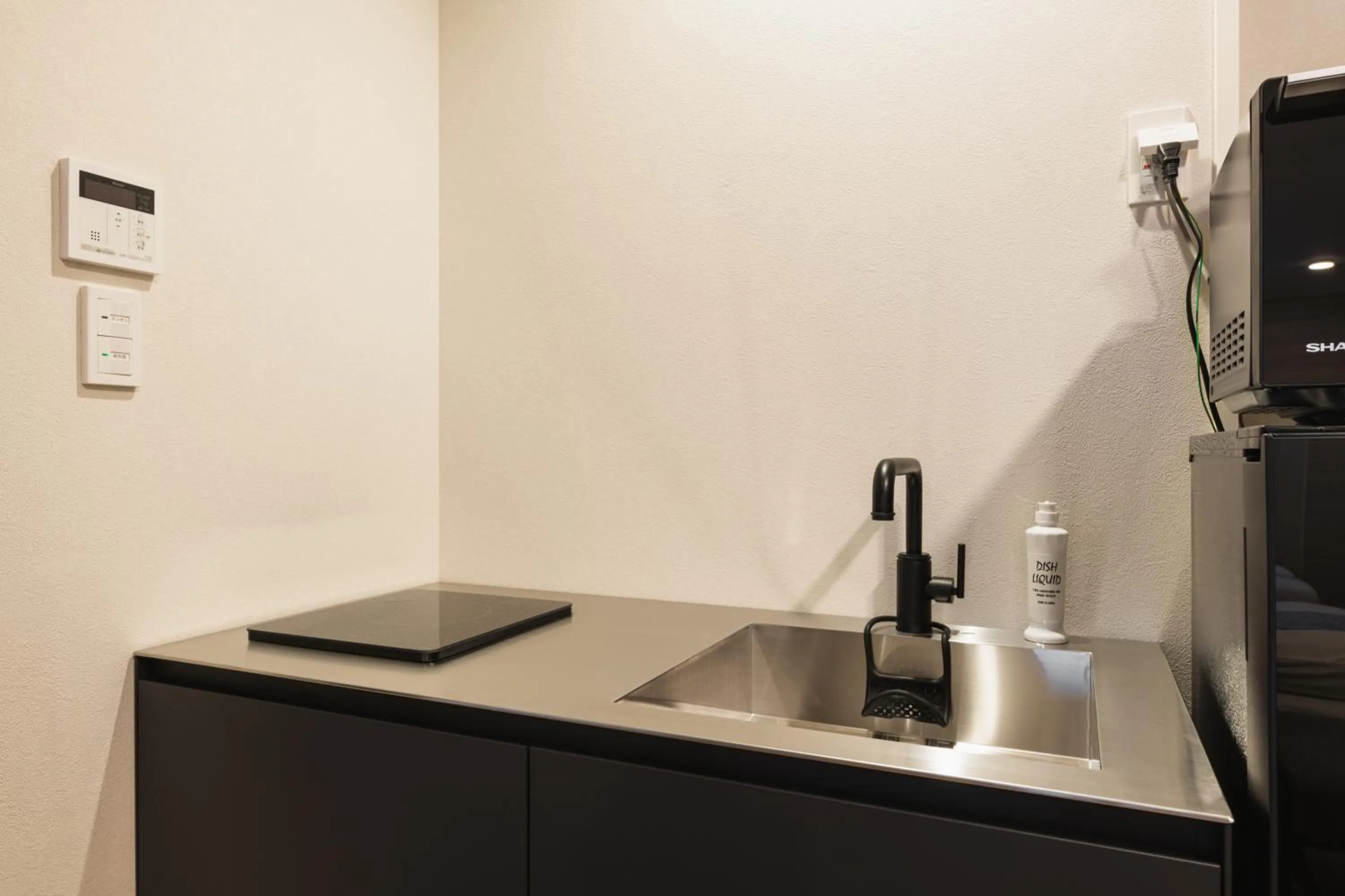 Kitchen or kitchenette in GRAND BASE Nagasaki