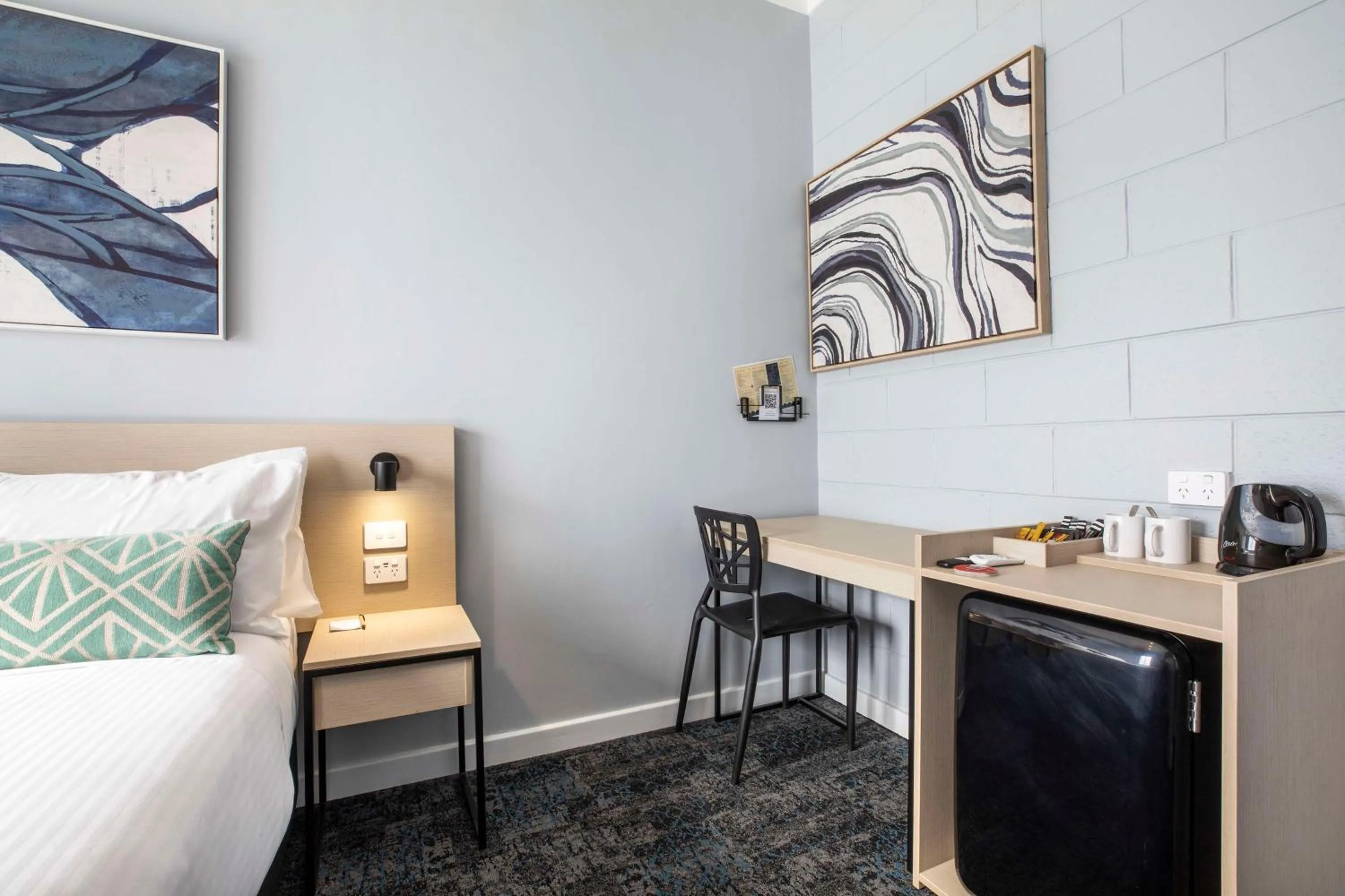 Bedroom, Bed in Nightcap at Rex Hotel