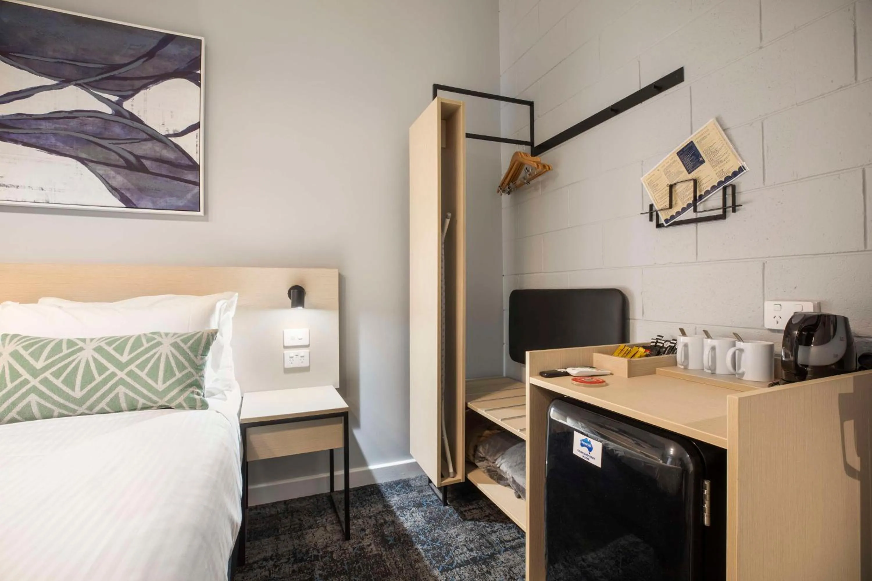 Bedroom, Bed in Nightcap at Rex Hotel