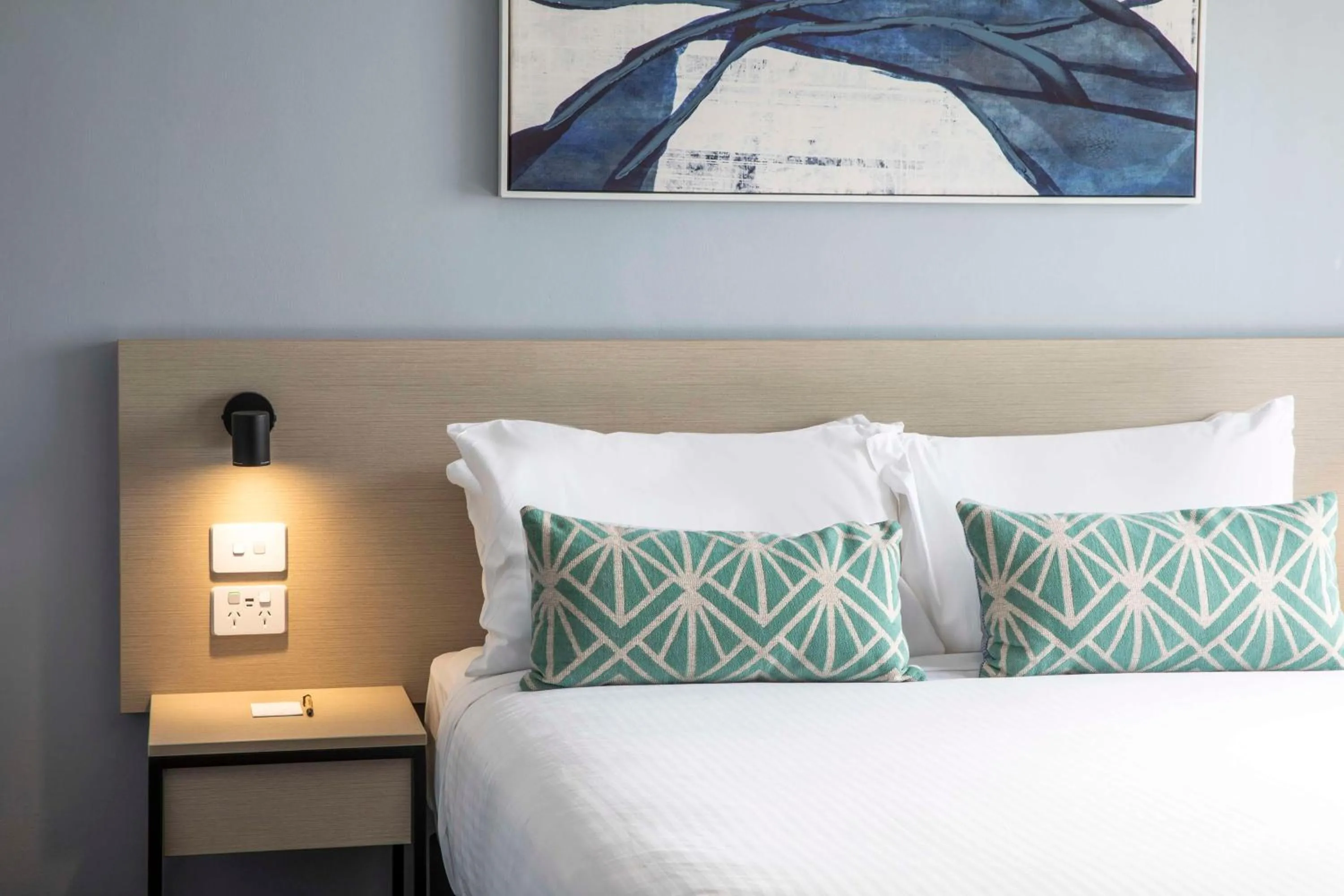 Bedroom, Bed in Nightcap at Rex Hotel