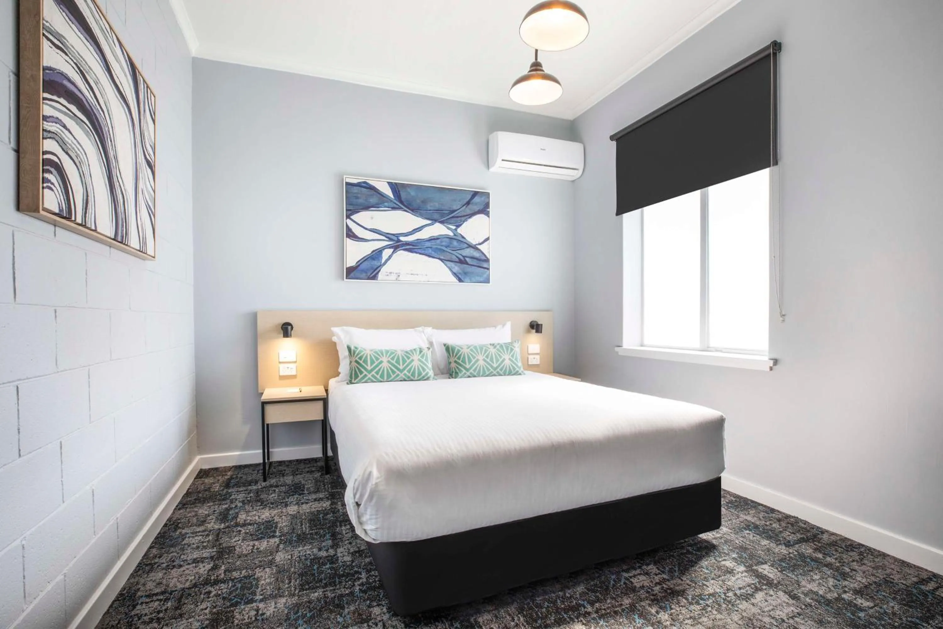 Bedroom, Bed in Nightcap at Rex Hotel