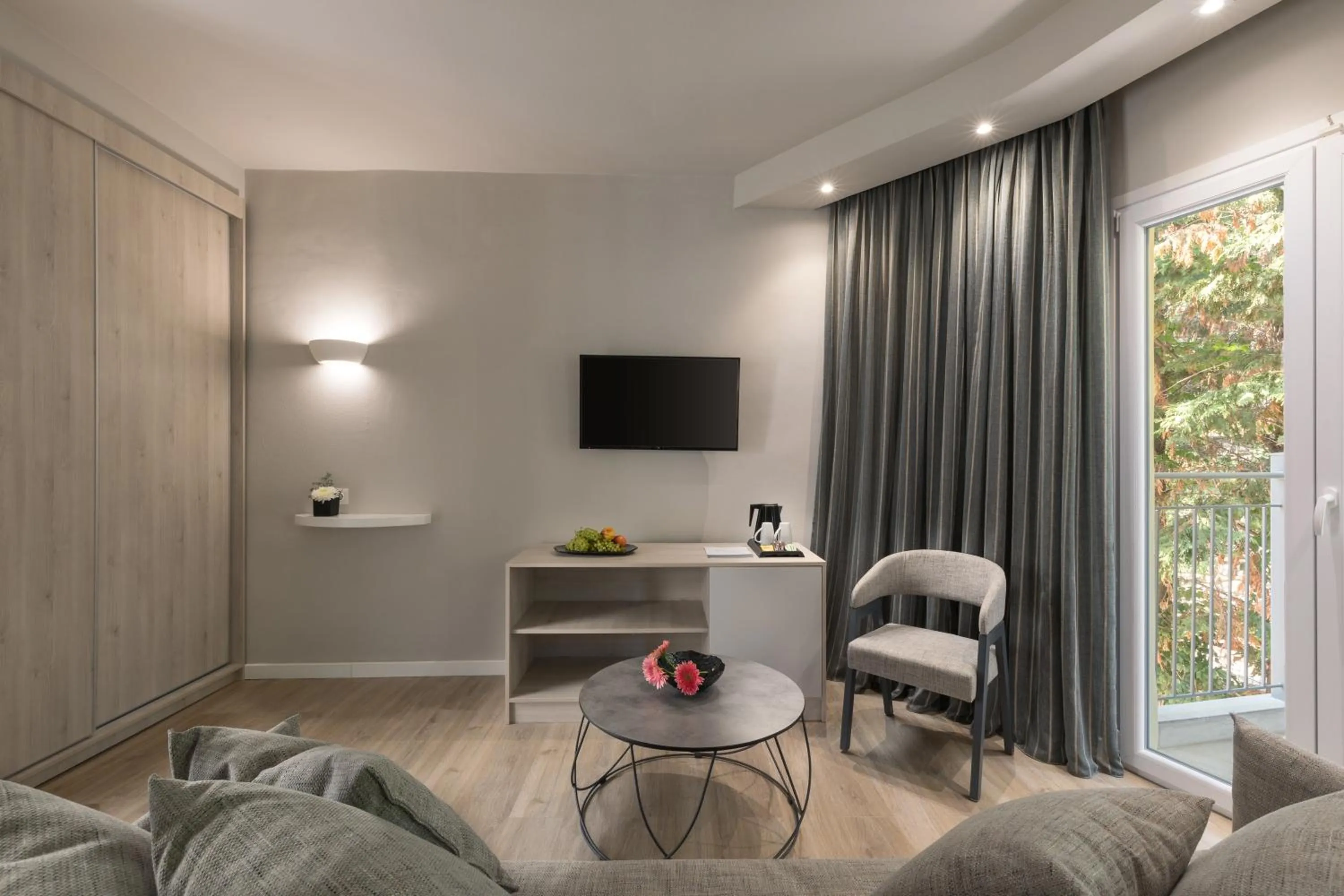 TV and multimedia in Melina Oasis Boutique Hotel