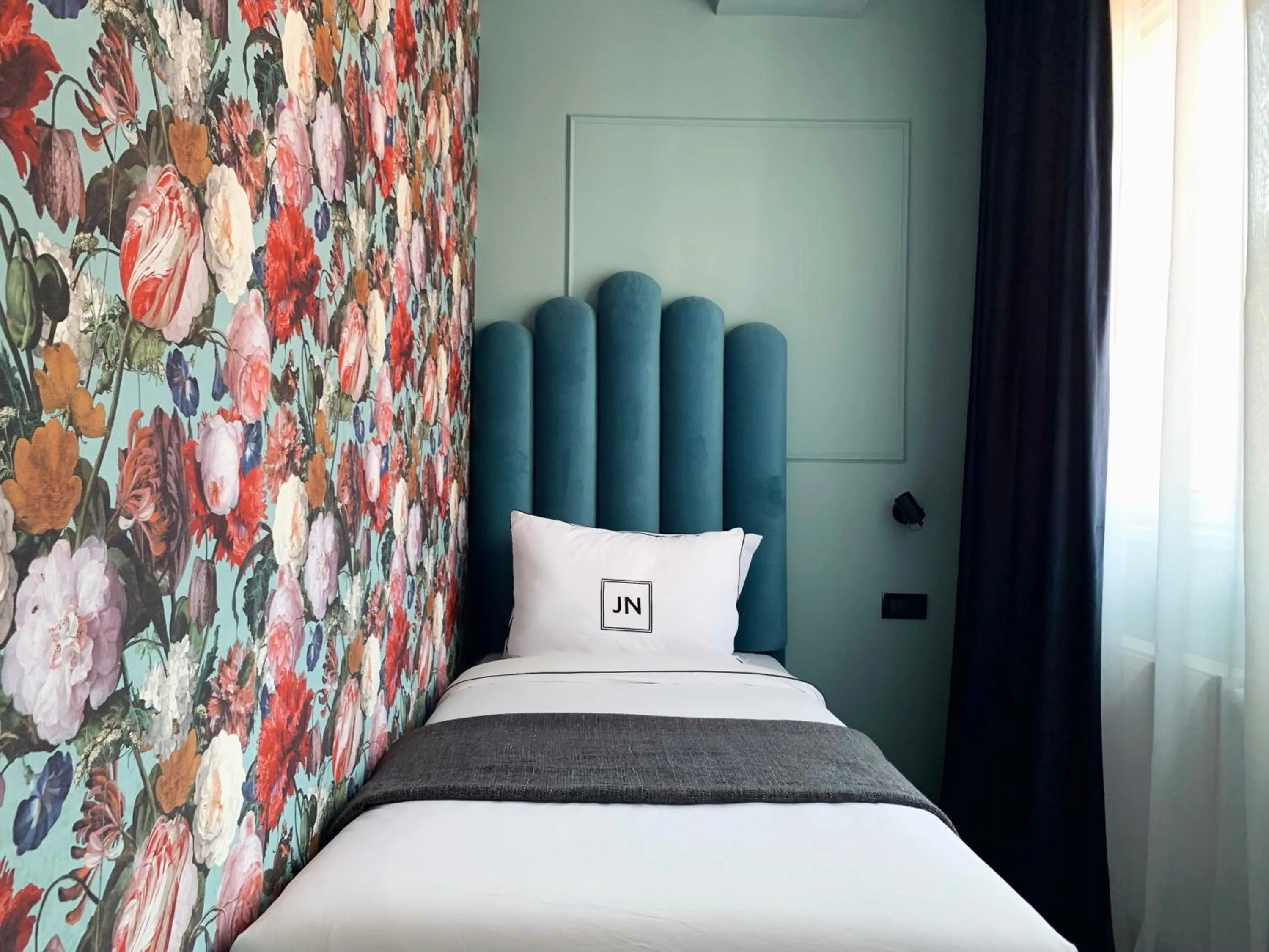 Bed in JN Boutique Hotel