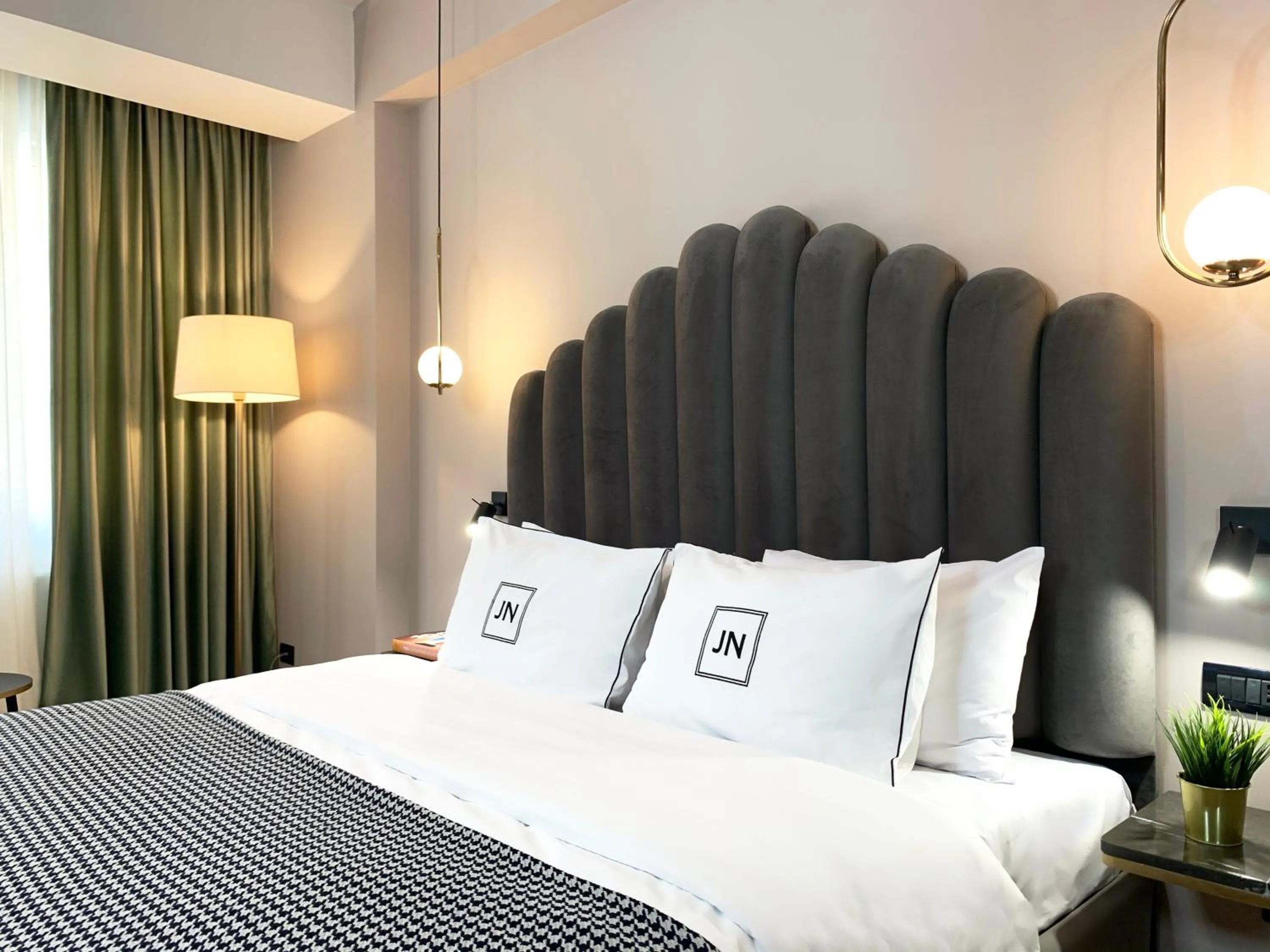 Bed in JN Boutique Hotel