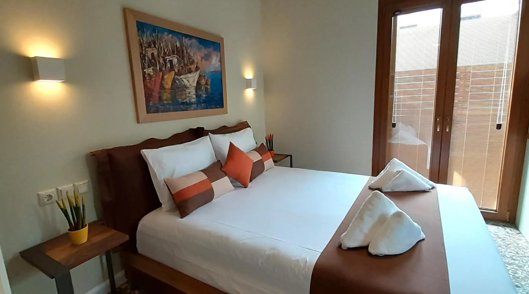 Bed in Andros 4 All Seasons Villas & Suites