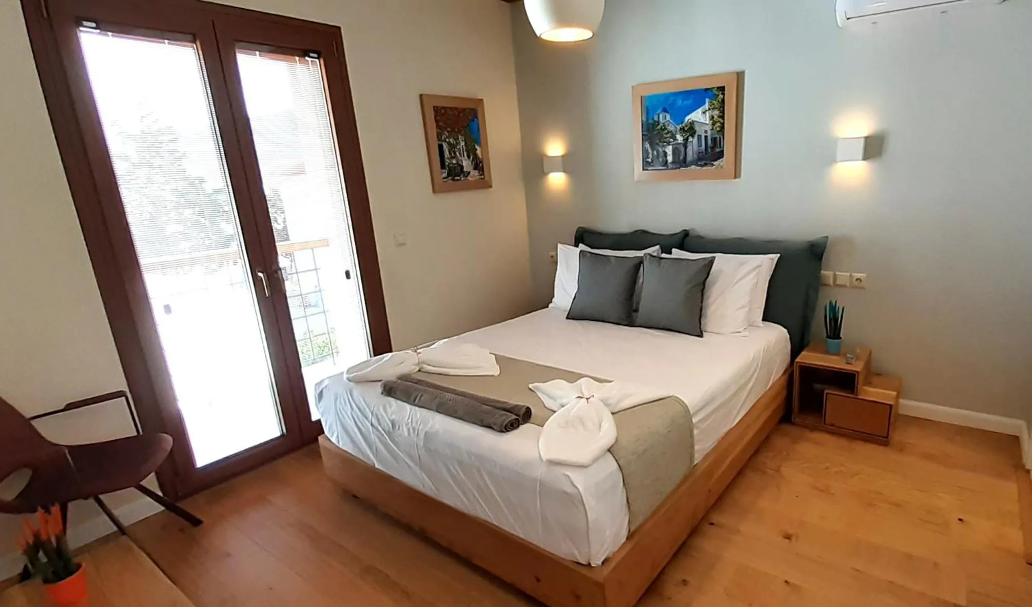 Bed in Andros 4 All Seasons Villas & Suites