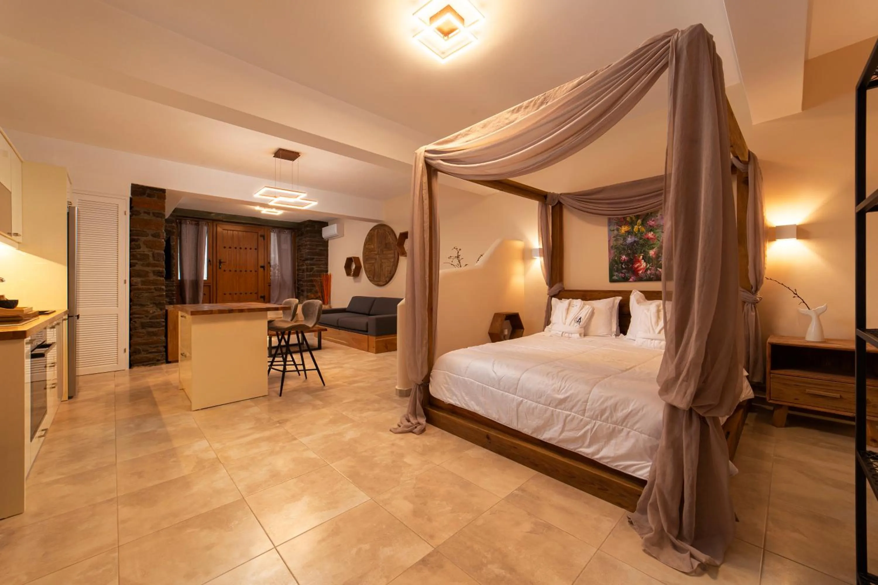 Bed in Andros 4 All Seasons Villas & Suites