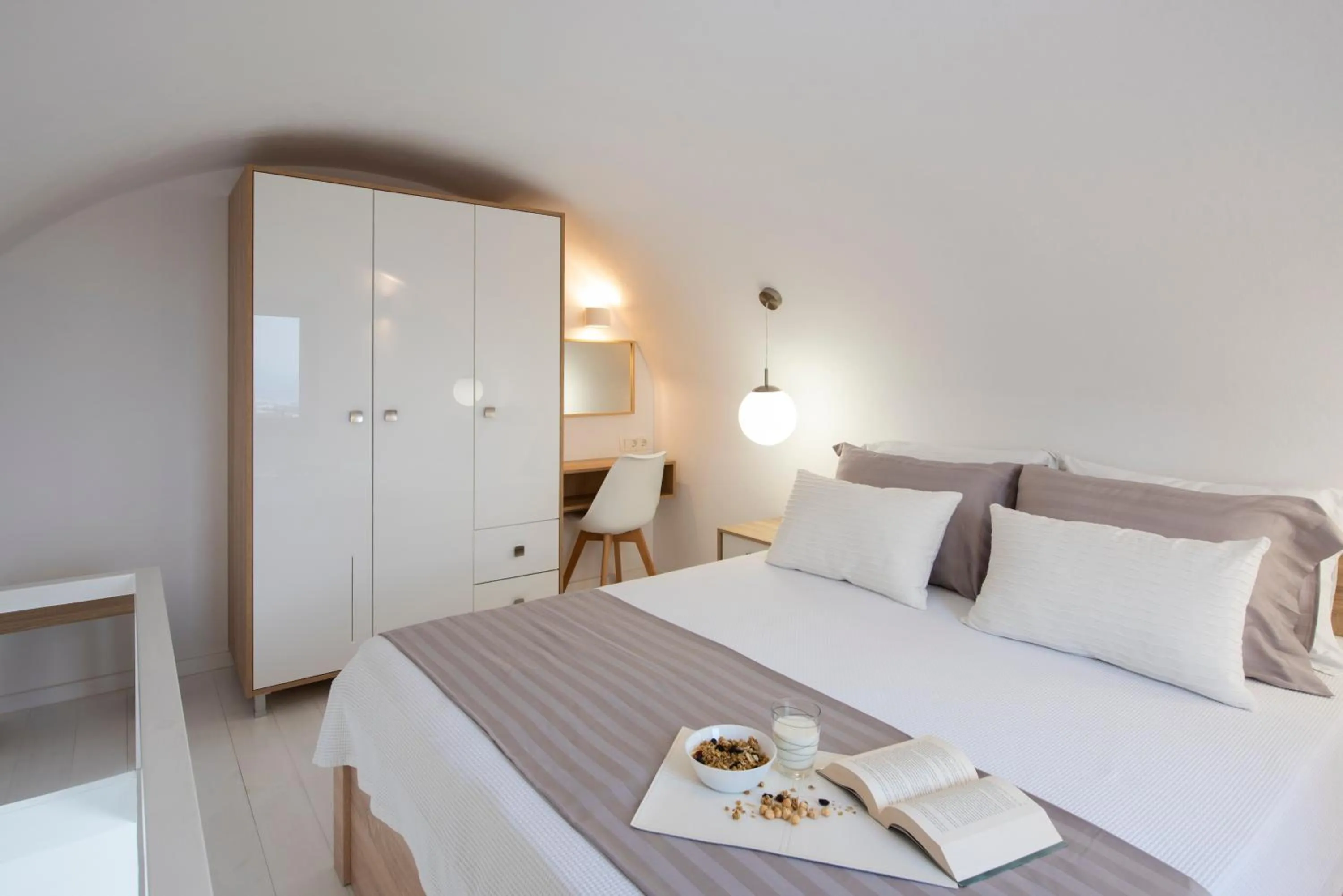 Bed in White Orchid Suites