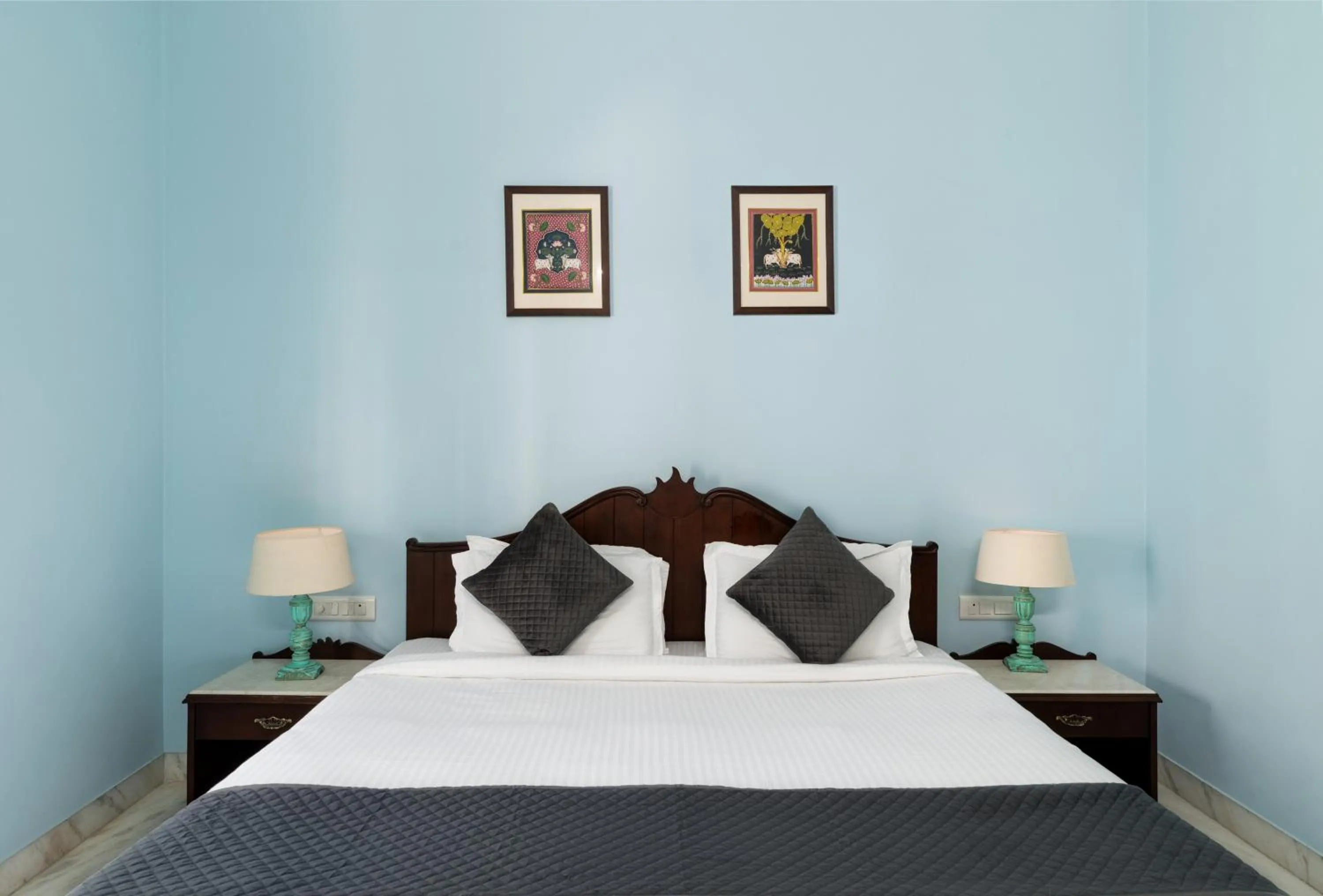 Bed in Chandra Vilas Heritage stay