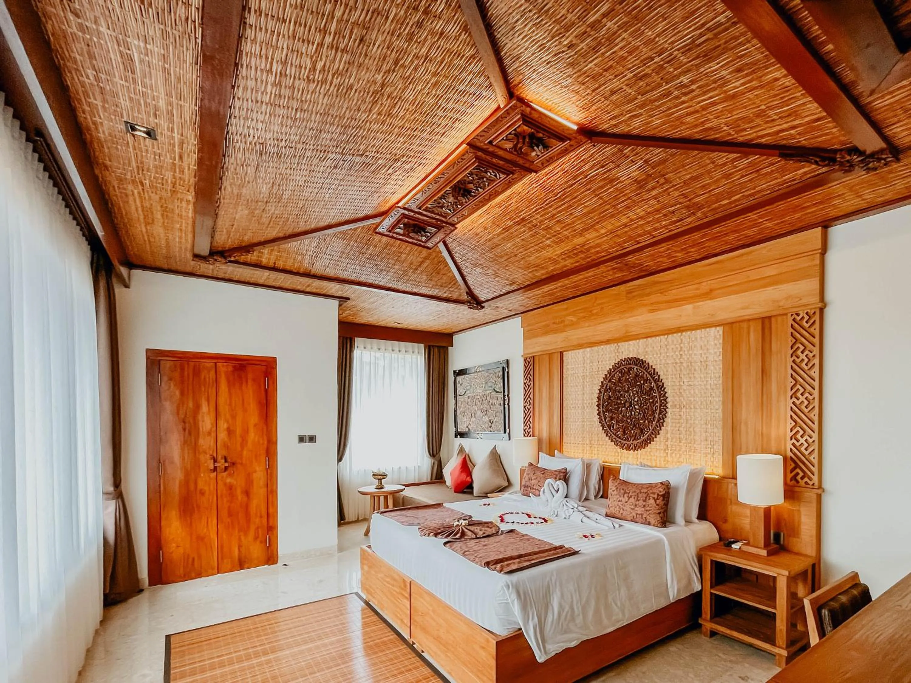 Bed in Sakti Garden Resort & Spa