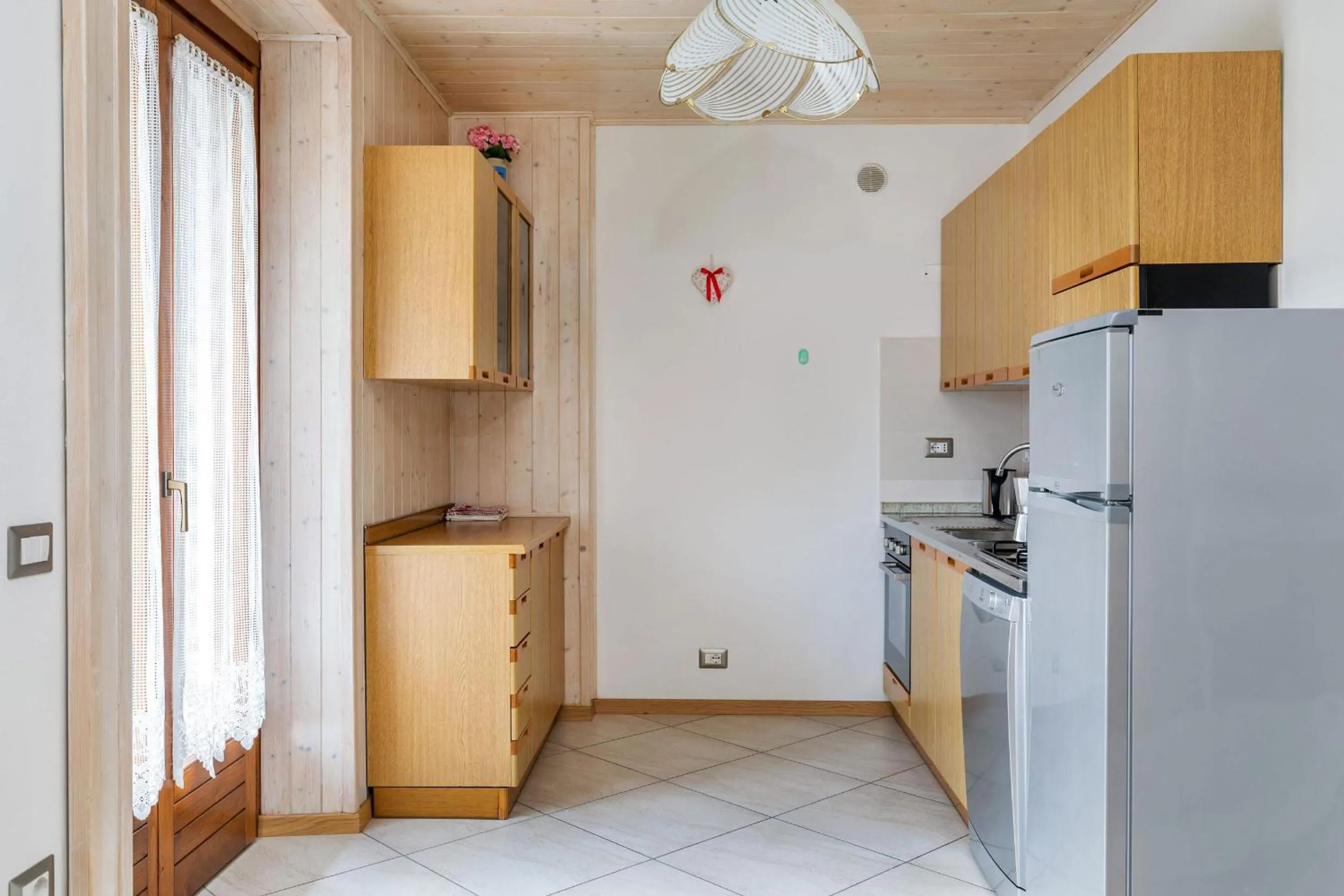 Kitchen or kitchenette in Appartamenti Residenza Pineta