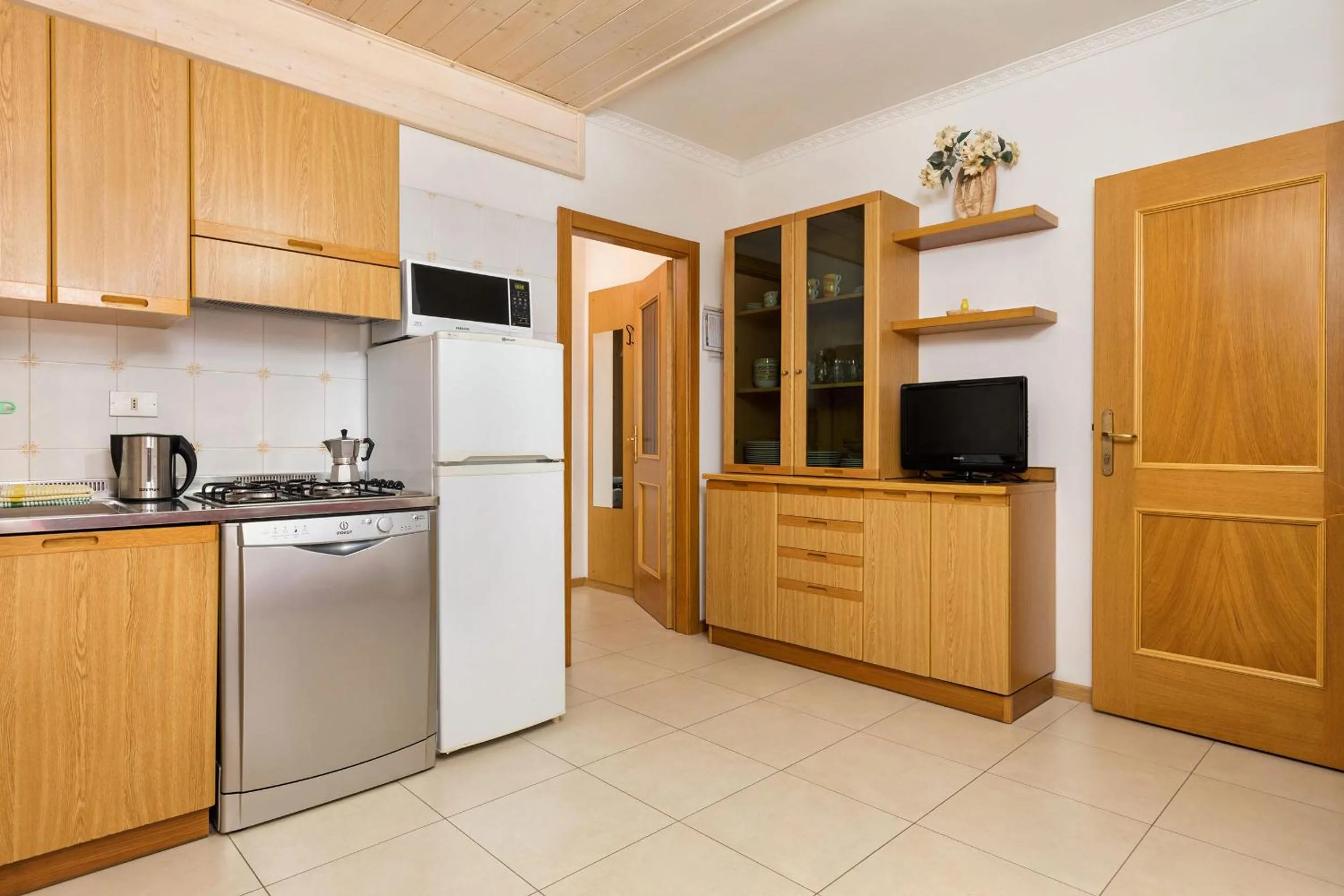Kitchen or kitchenette in Appartamenti Residenza Pineta
