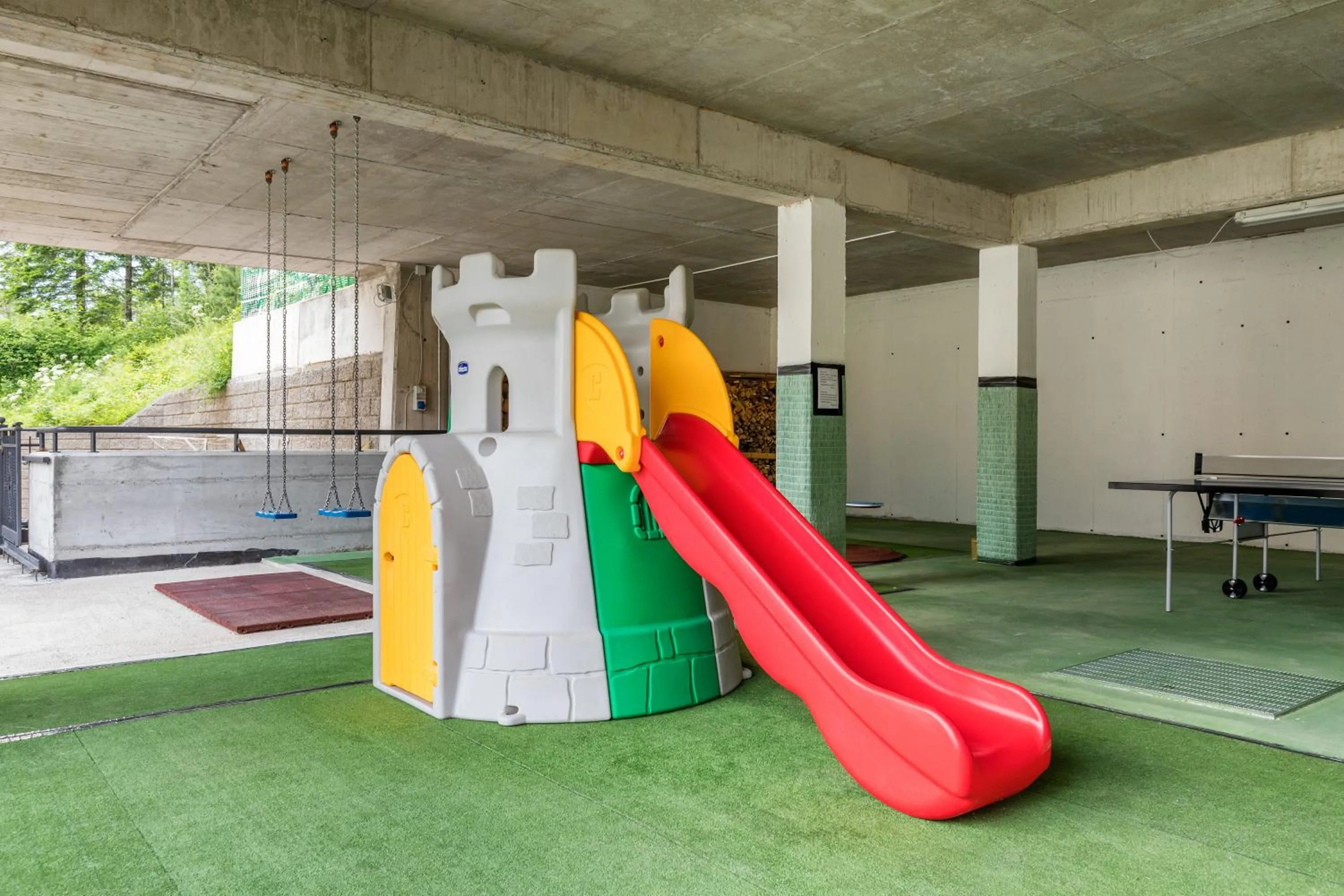 Children play ground in Appartamenti Residenza Pineta